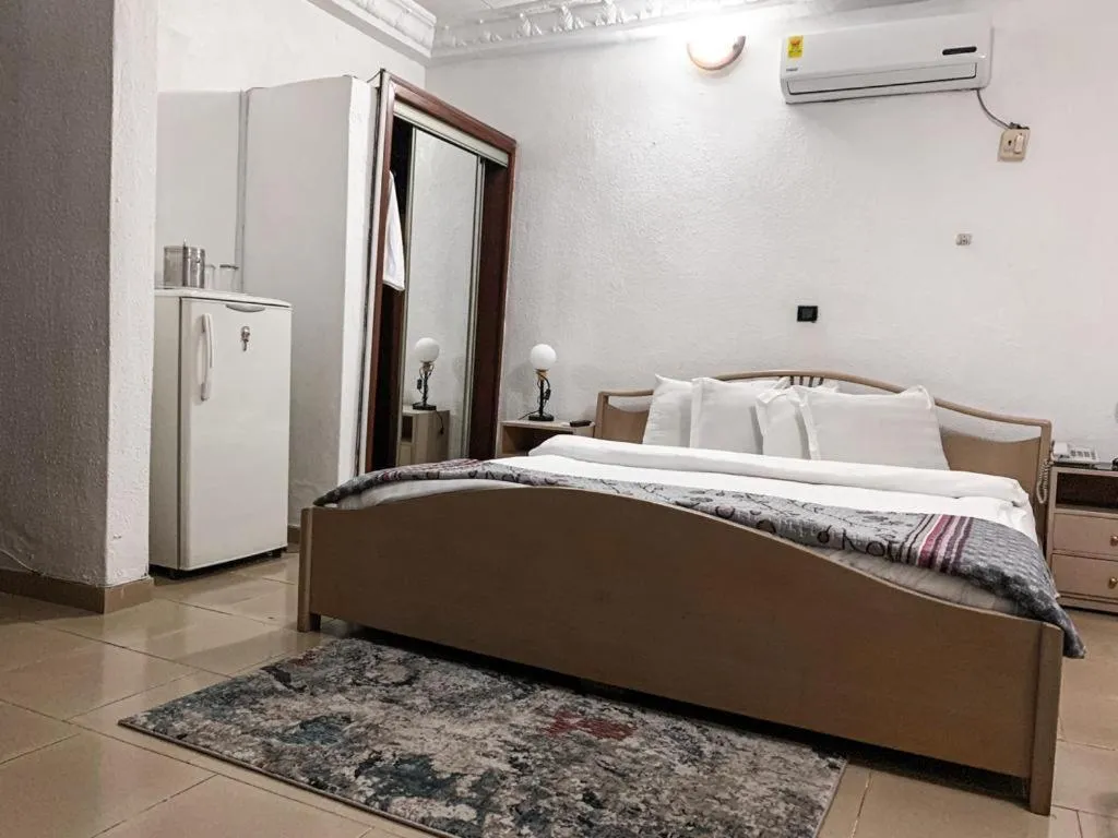 Bed in Hill View Hotel West Airport