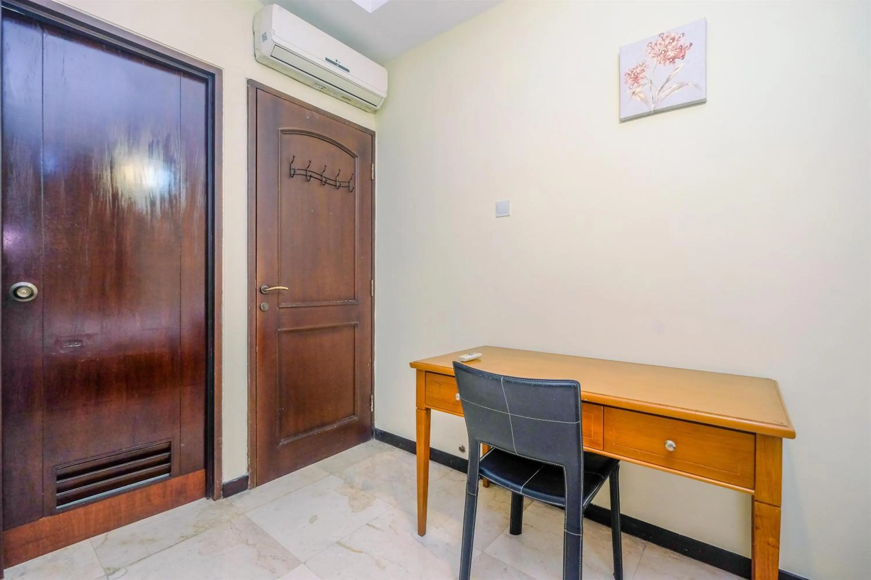 Seating area in Exclusive with City View 3BR Apartment Bellagio Residence By Travelio