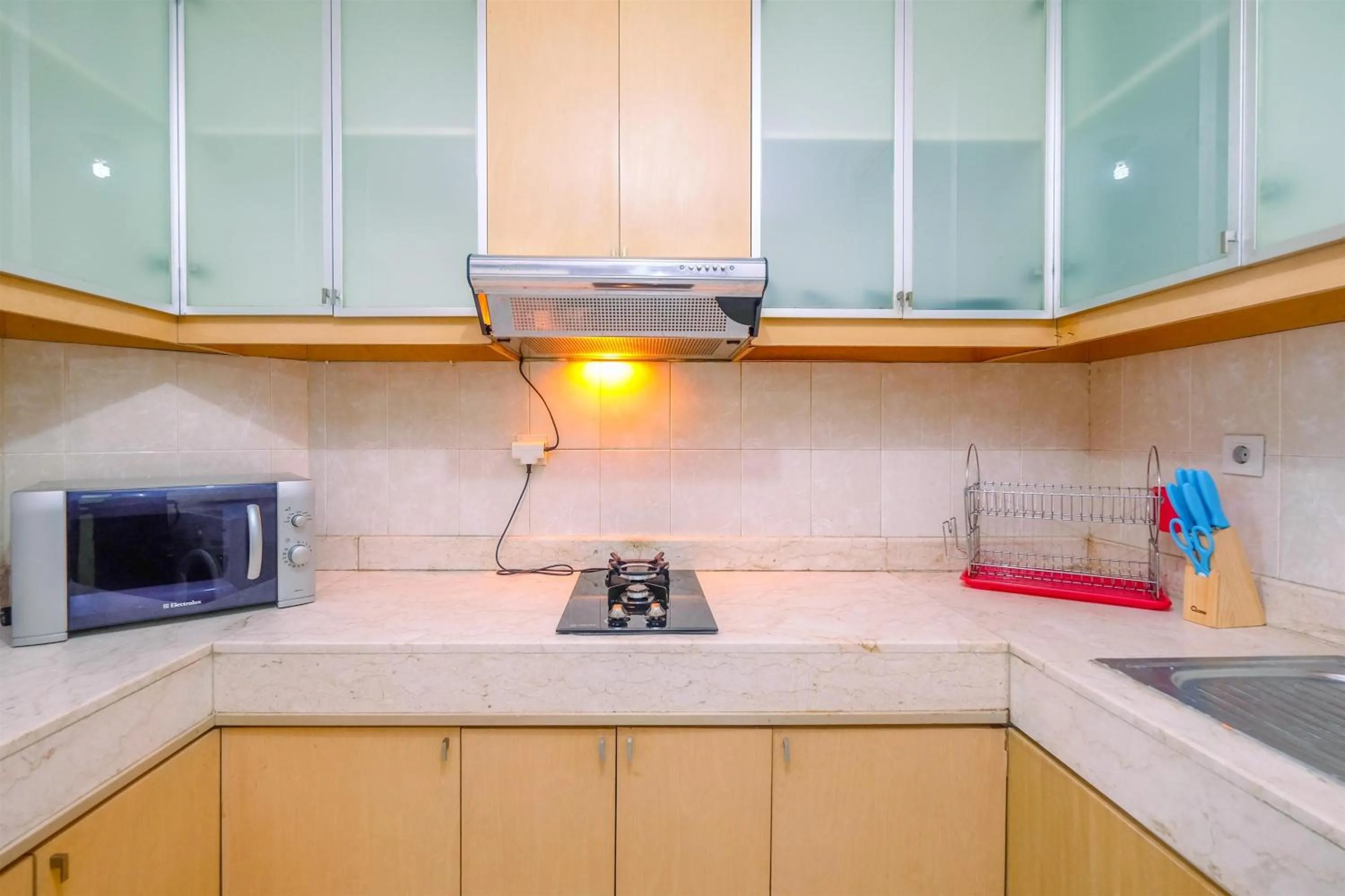 Kitchen or kitchenette in Exclusive with City View 3BR Apartment Bellagio Residence By Travelio