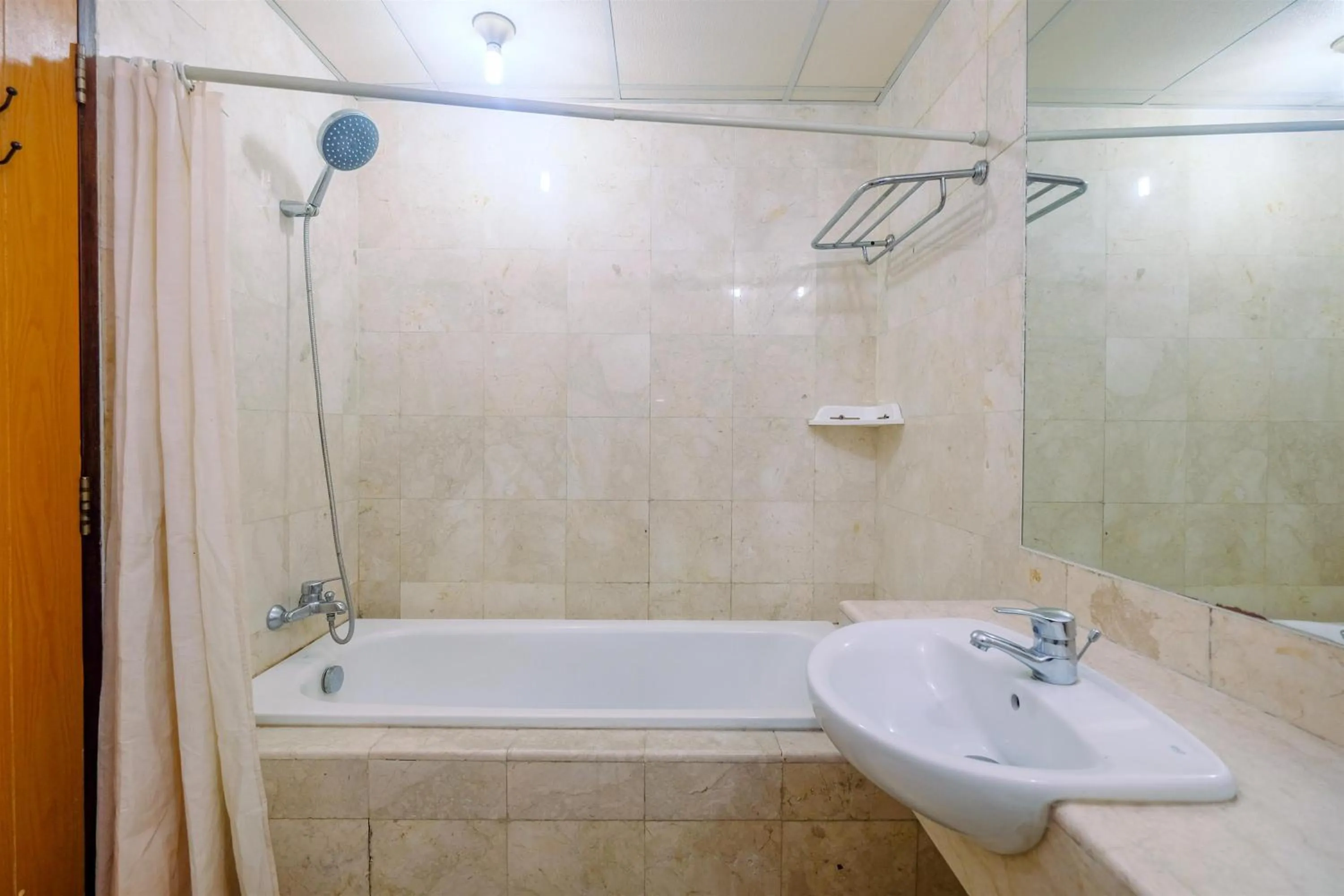Bathroom in Exclusive with City View 3BR Apartment Bellagio Residence By Travelio