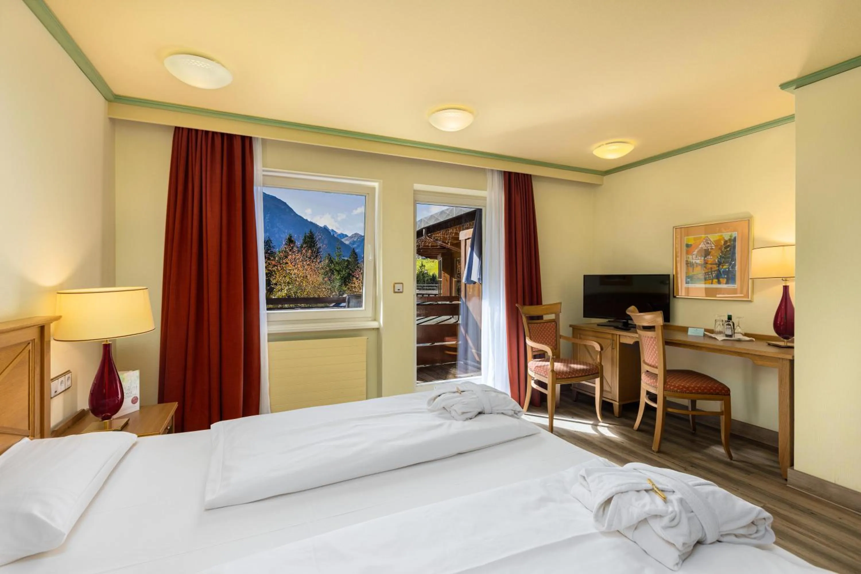 View (from property/room), Bed in IFA Alpenhof Wildental Hotel Kleinwalsertal Adults only