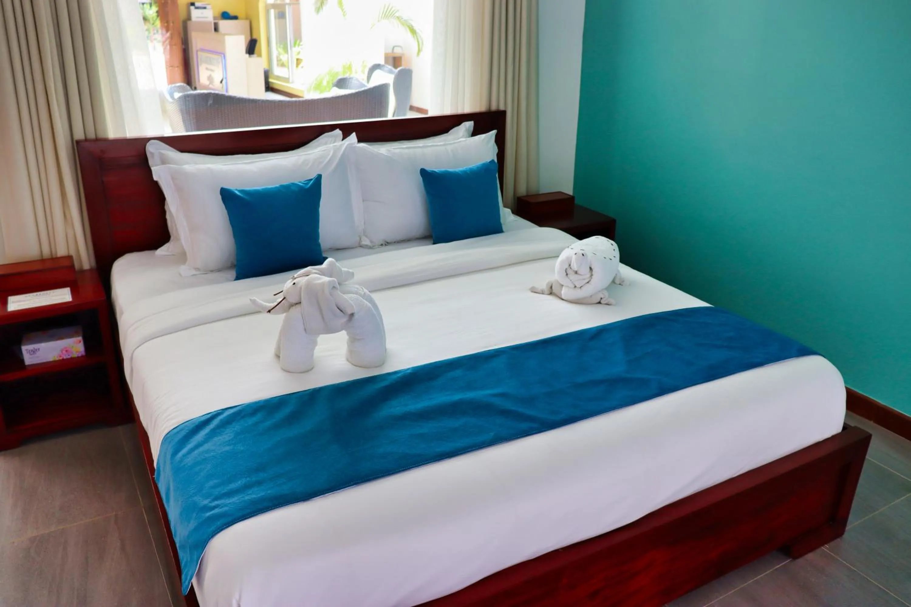 Bed in Searenity Beach Villa