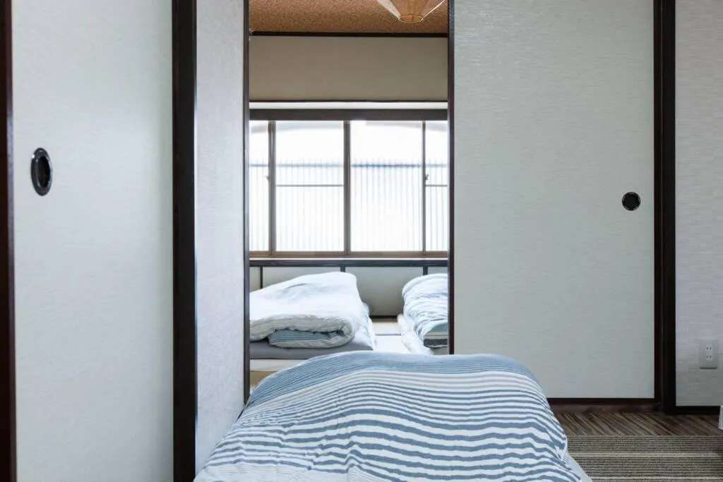 Bed in 伏見稲荷ハウス Fushimi Inari House