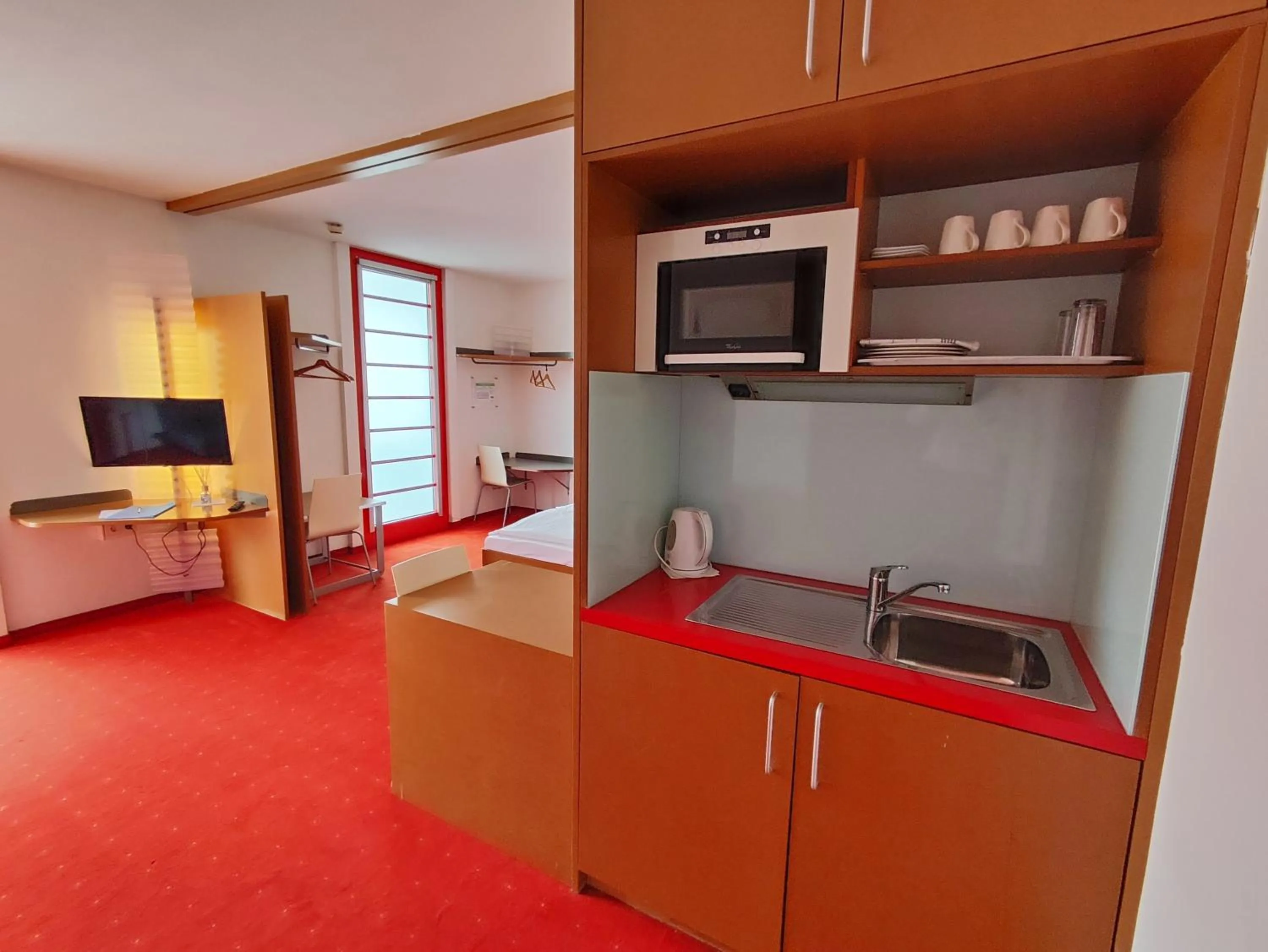 stove in Orange Wings Wiener Neustadt