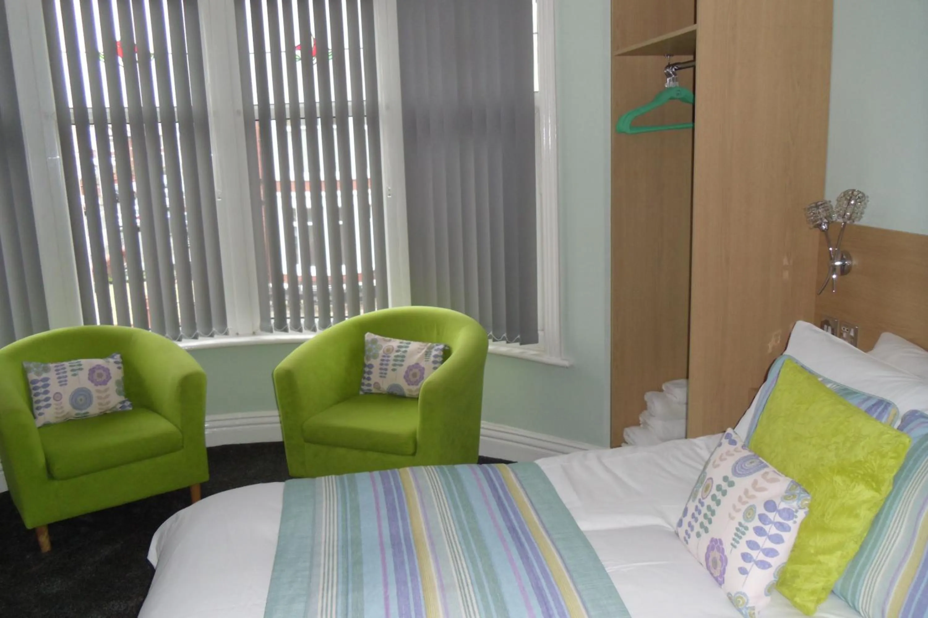 Bed in The Beaucliffe Hotel