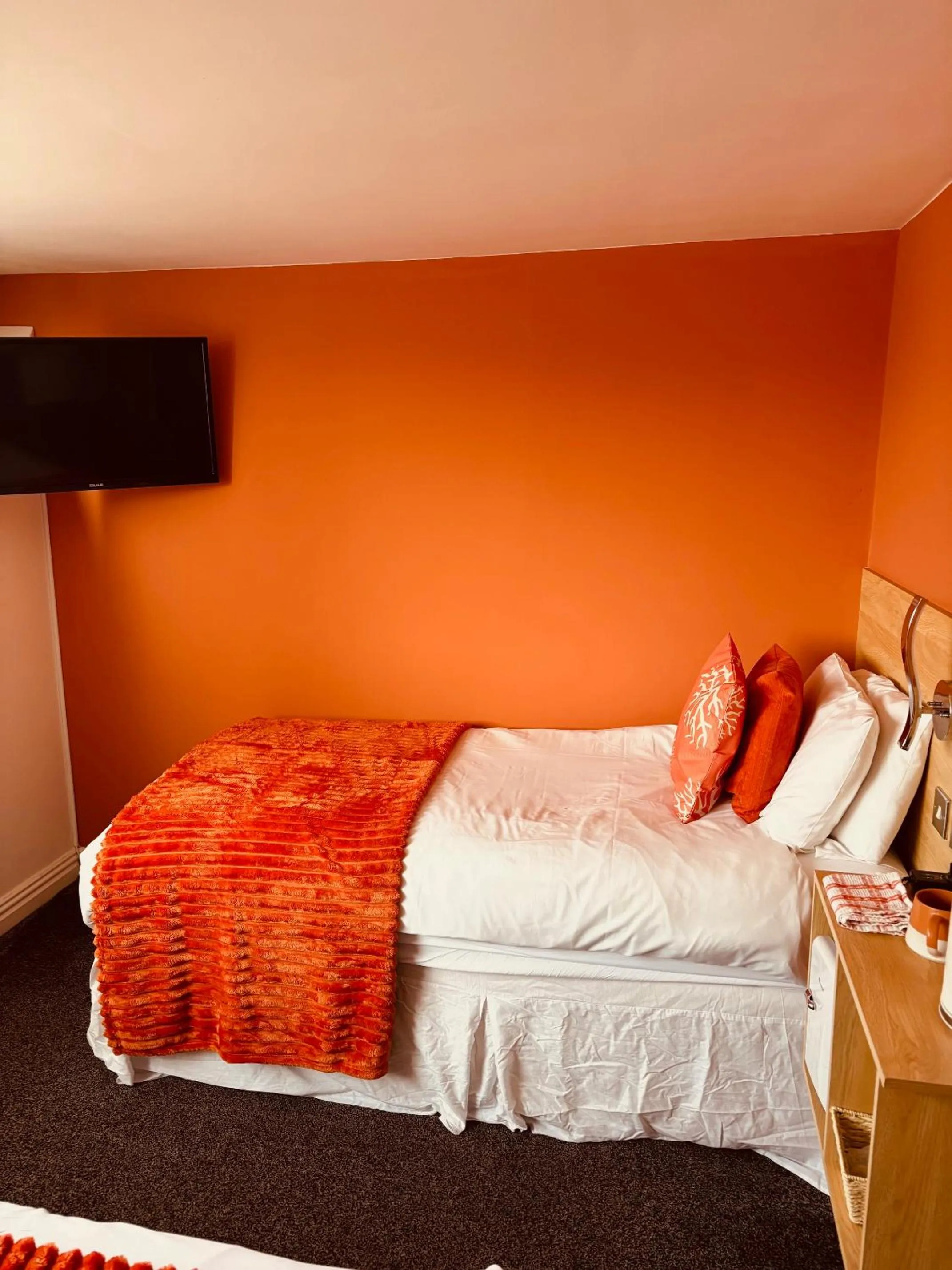 Bed in The Beaucliffe Hotel