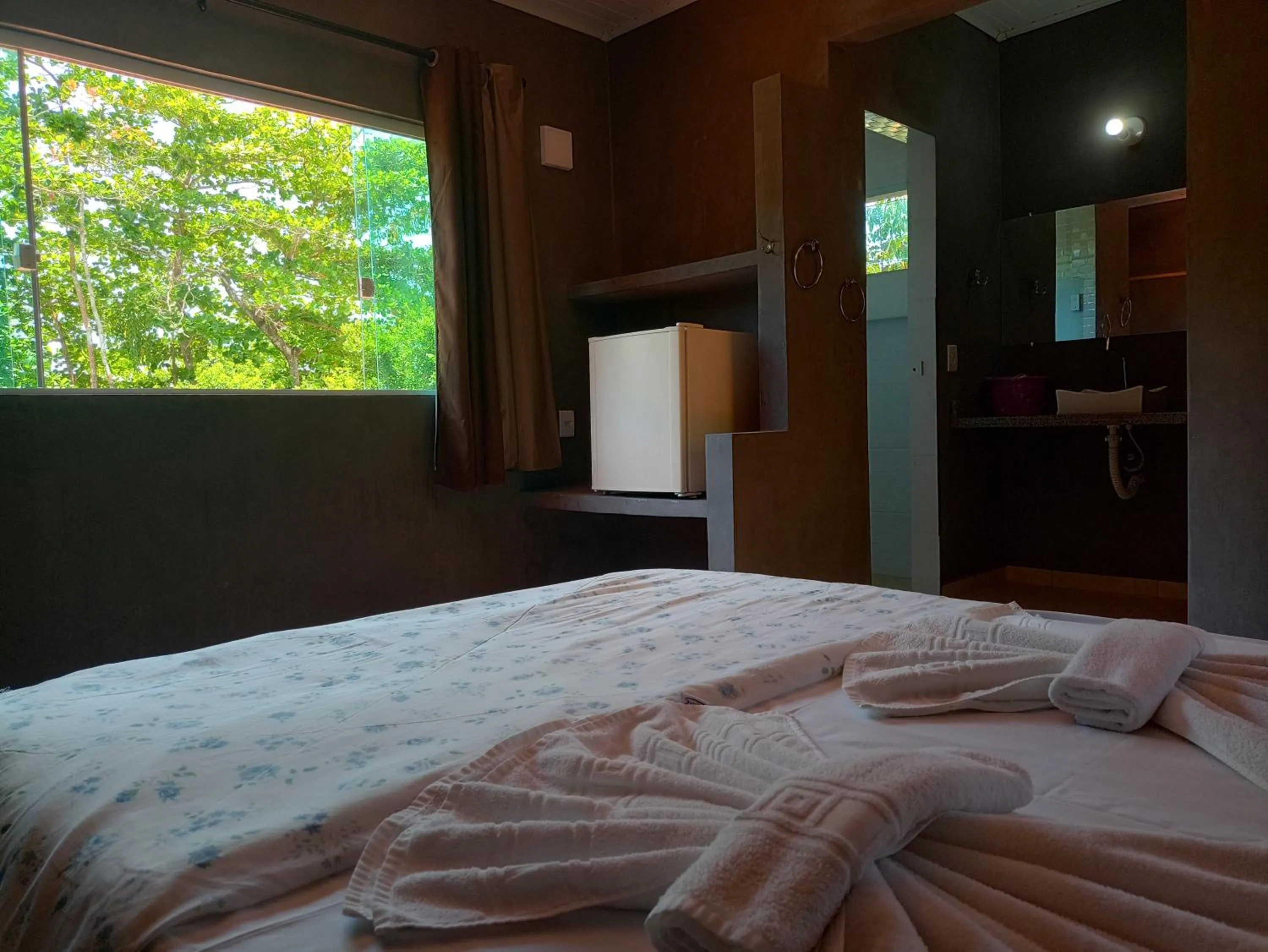 Photo of the whole room in Pousada ZEN Cumuruxatiba