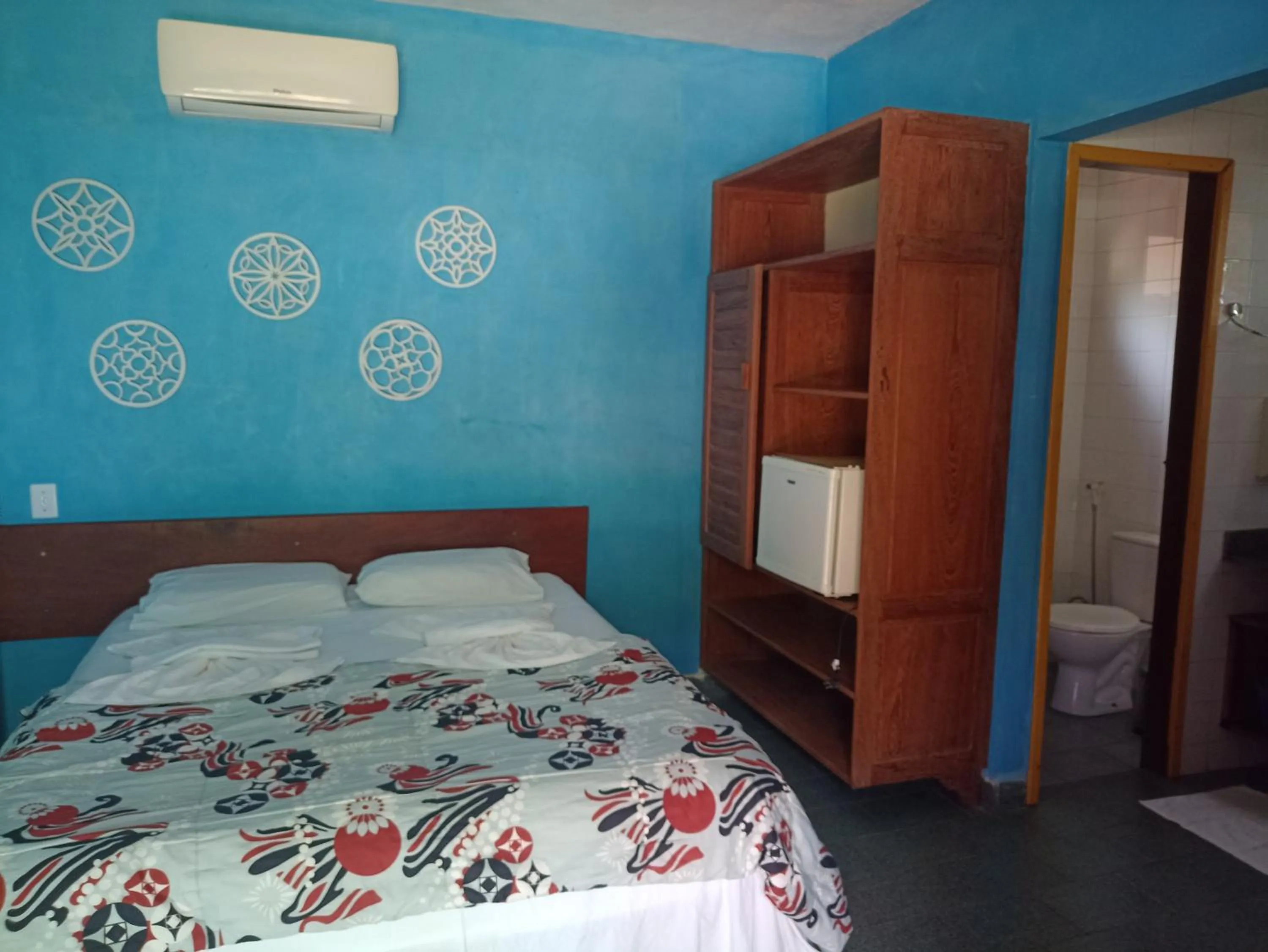 Bed in Pousada ZEN Cumuruxatiba