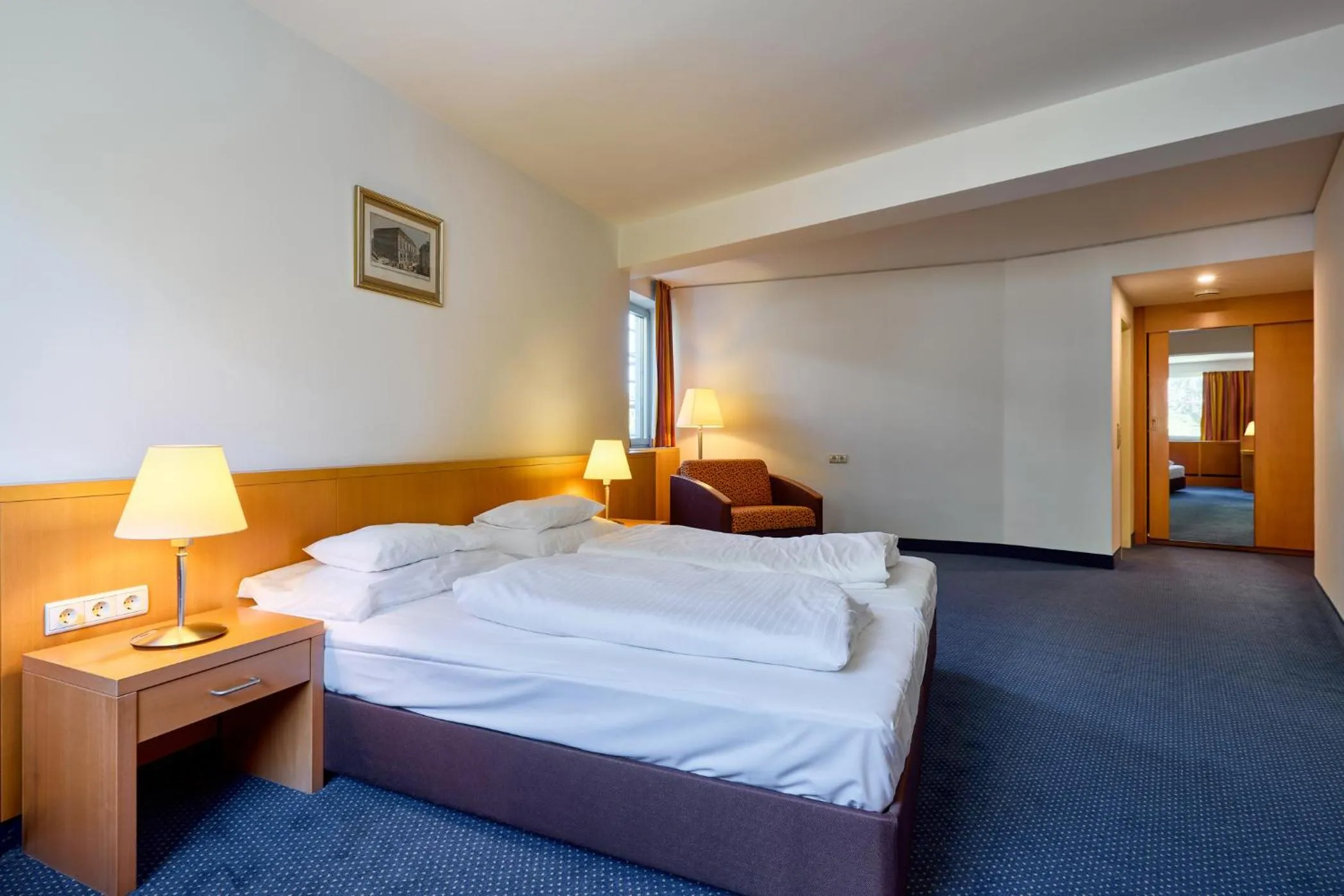 Bed in Hotel Strudlhof Vienna