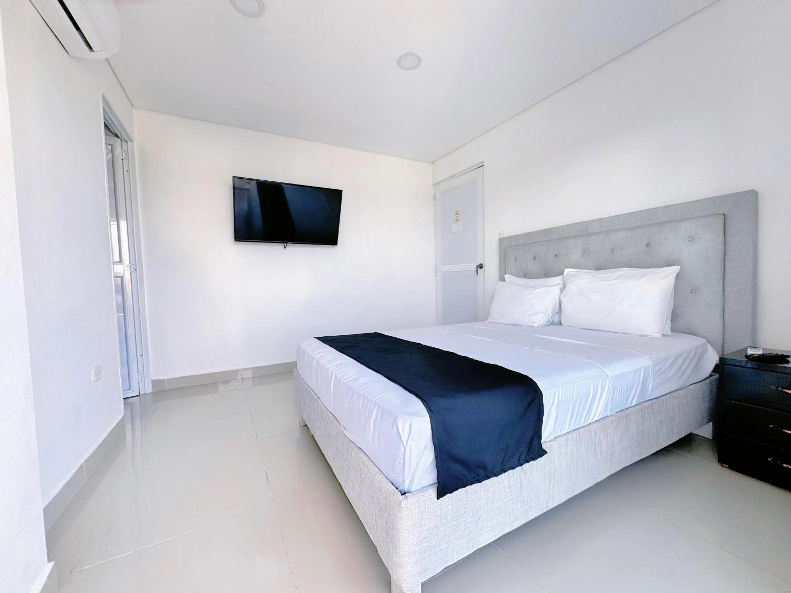 Photo of the whole room, Bed in Playa Norte Hotel