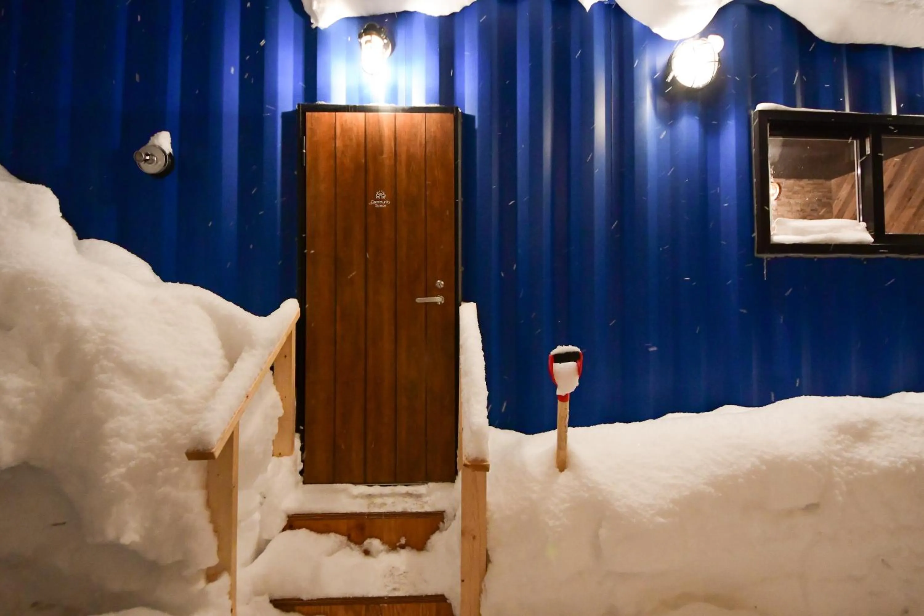 Communal lounge/ TV room in Rusutsu Grand Cabin