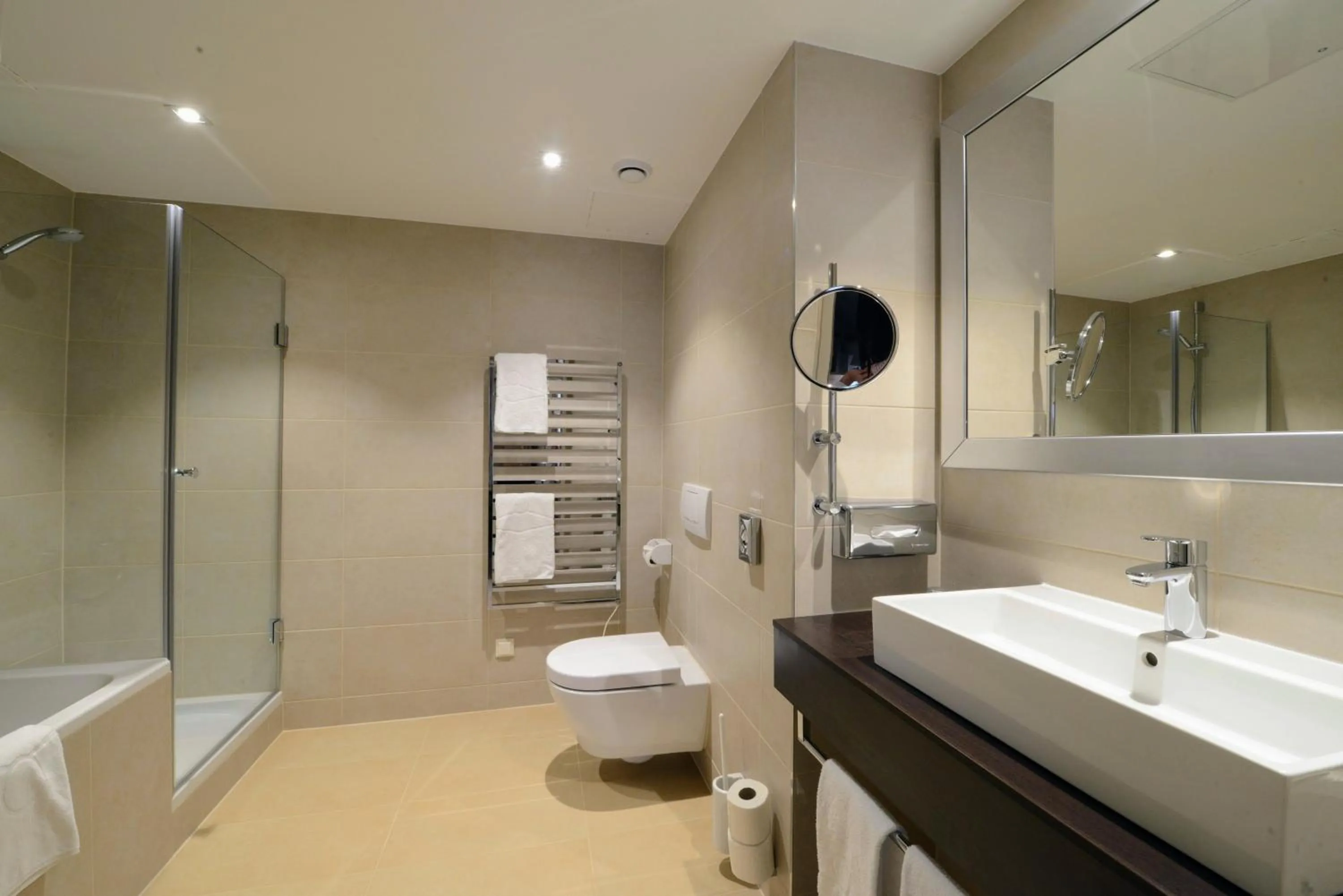 Shower in HiLight Suites Hotel