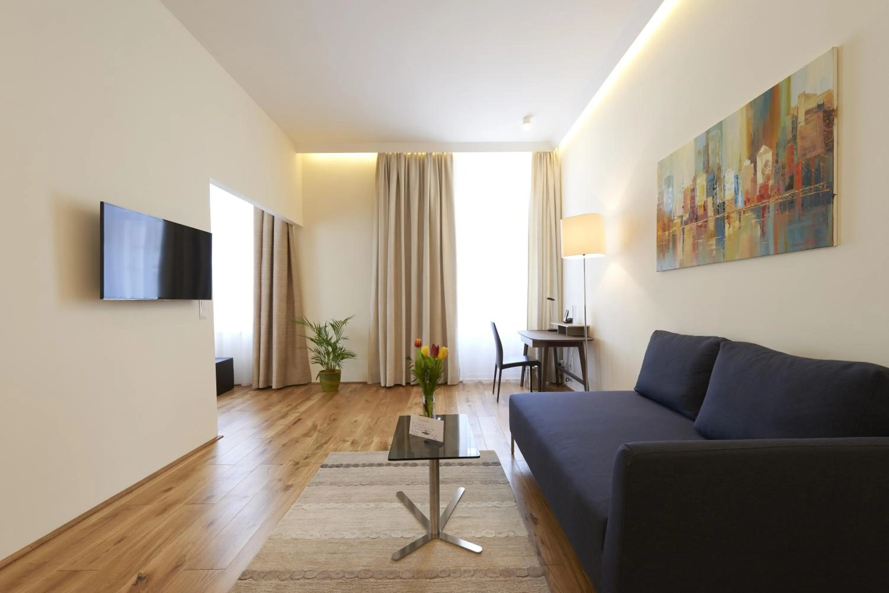 Living room in HiLight Suites Hotel