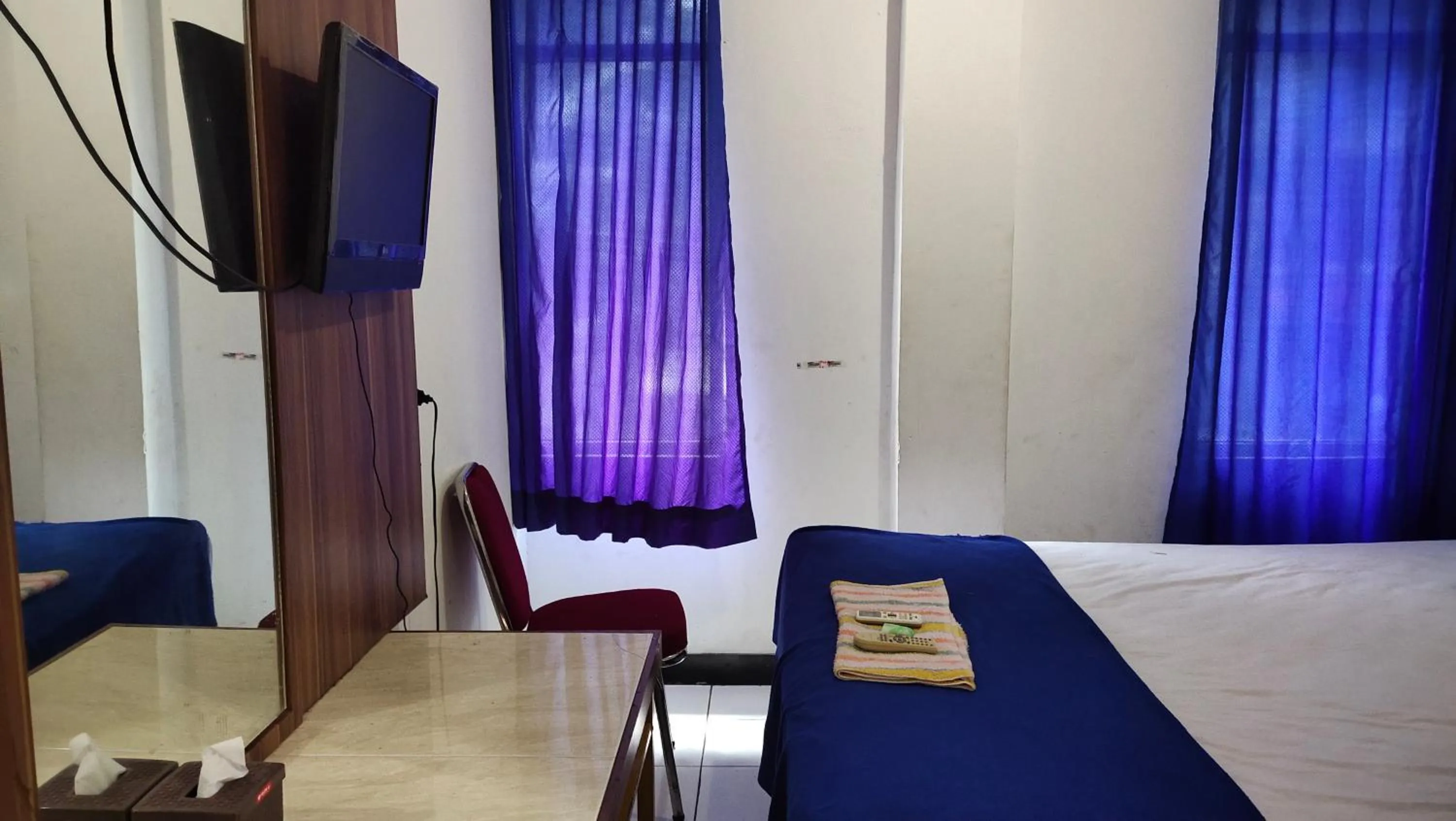 TV and multimedia in De' Premium Hotel Musi Raya