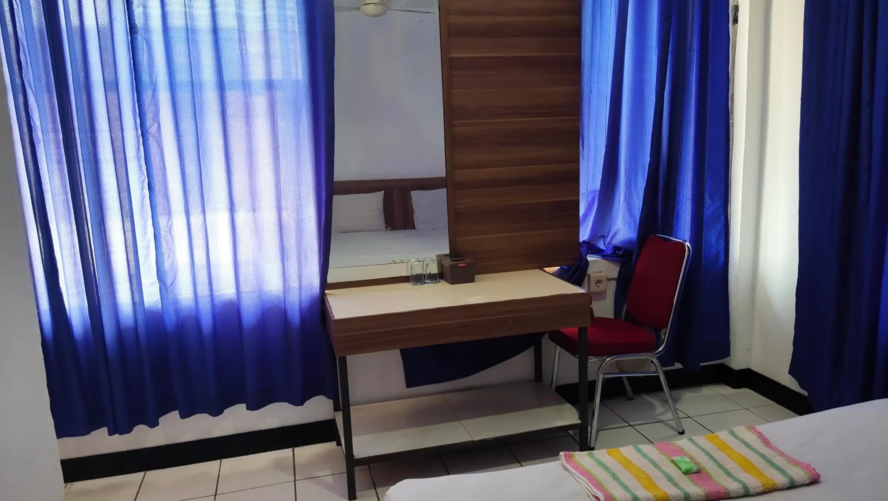 TV and multimedia in De' Premium Hotel Musi Raya