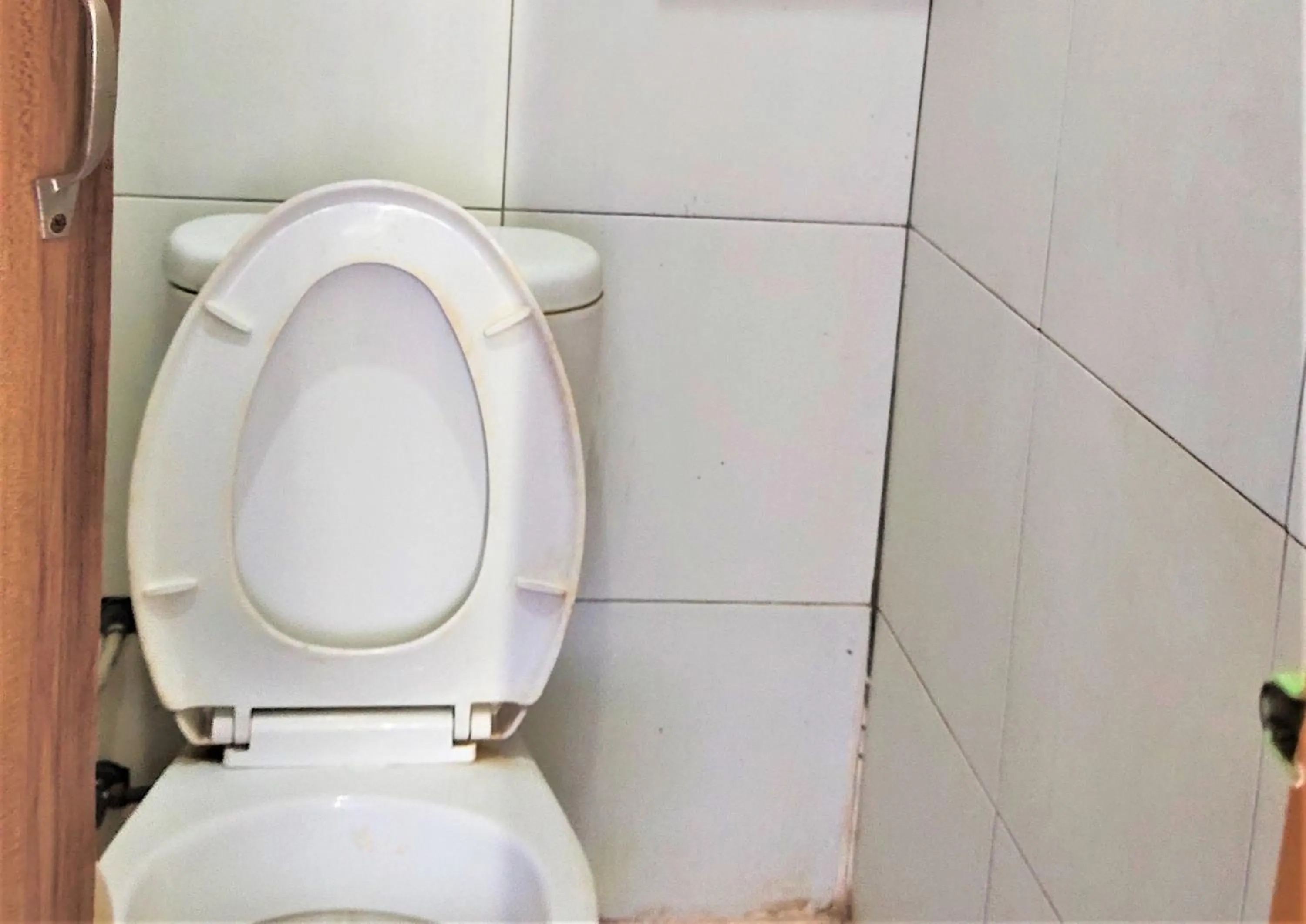 Bathroom in De' Premium Hotel Musi Raya