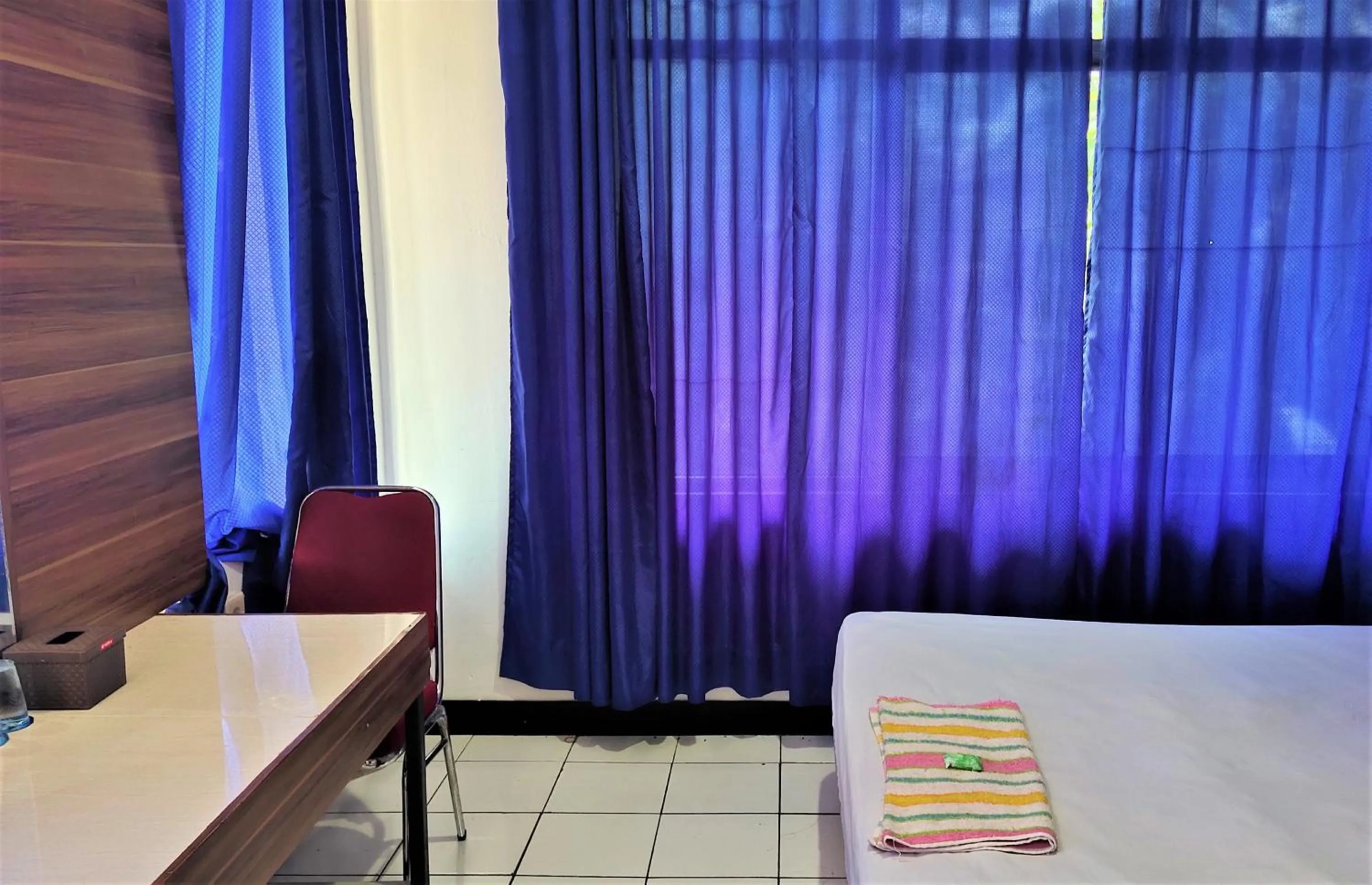 Bedroom in De' Premium Hotel Musi Raya