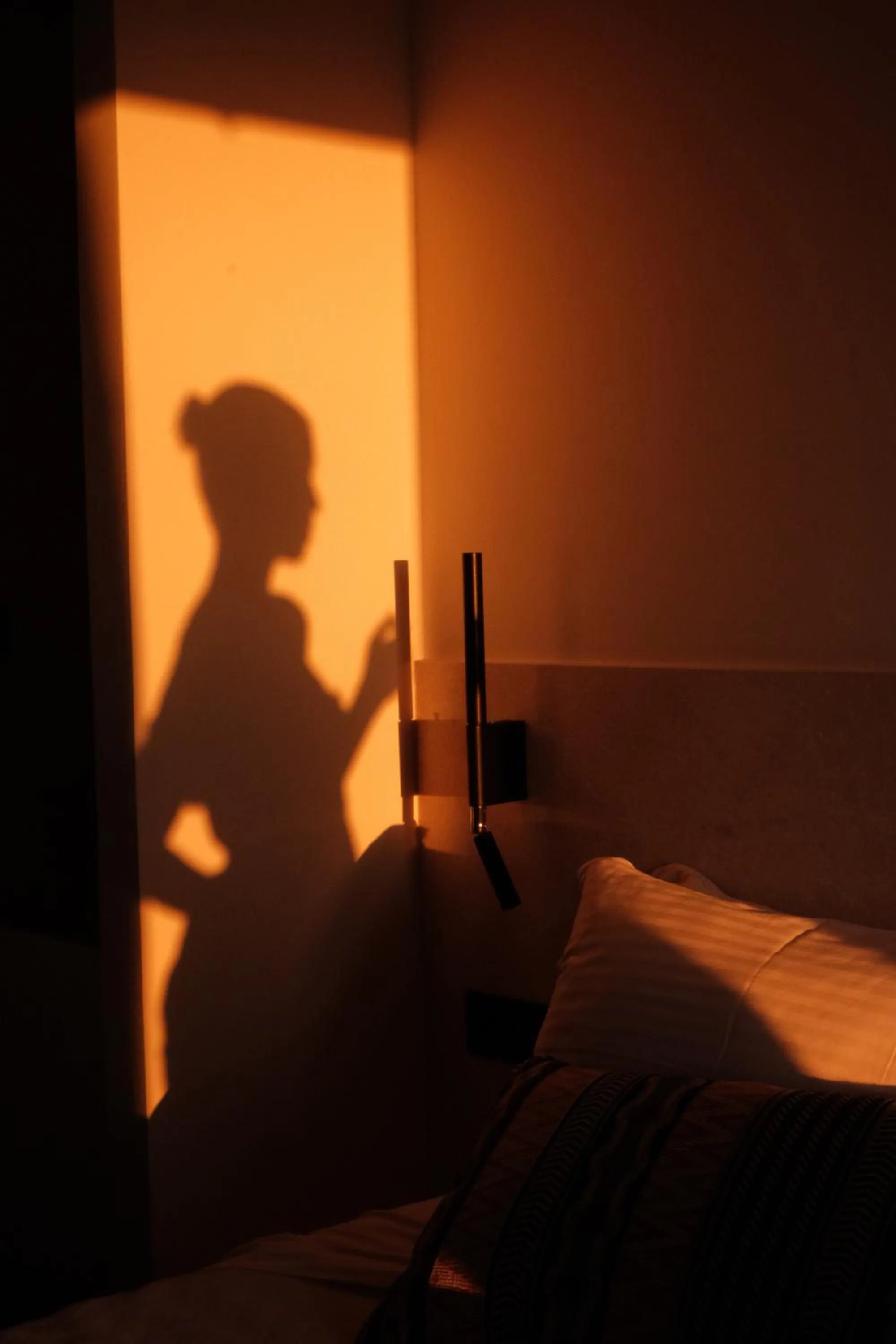 Bed in Yalos Hotel Sunset view Mykonos town private rooms