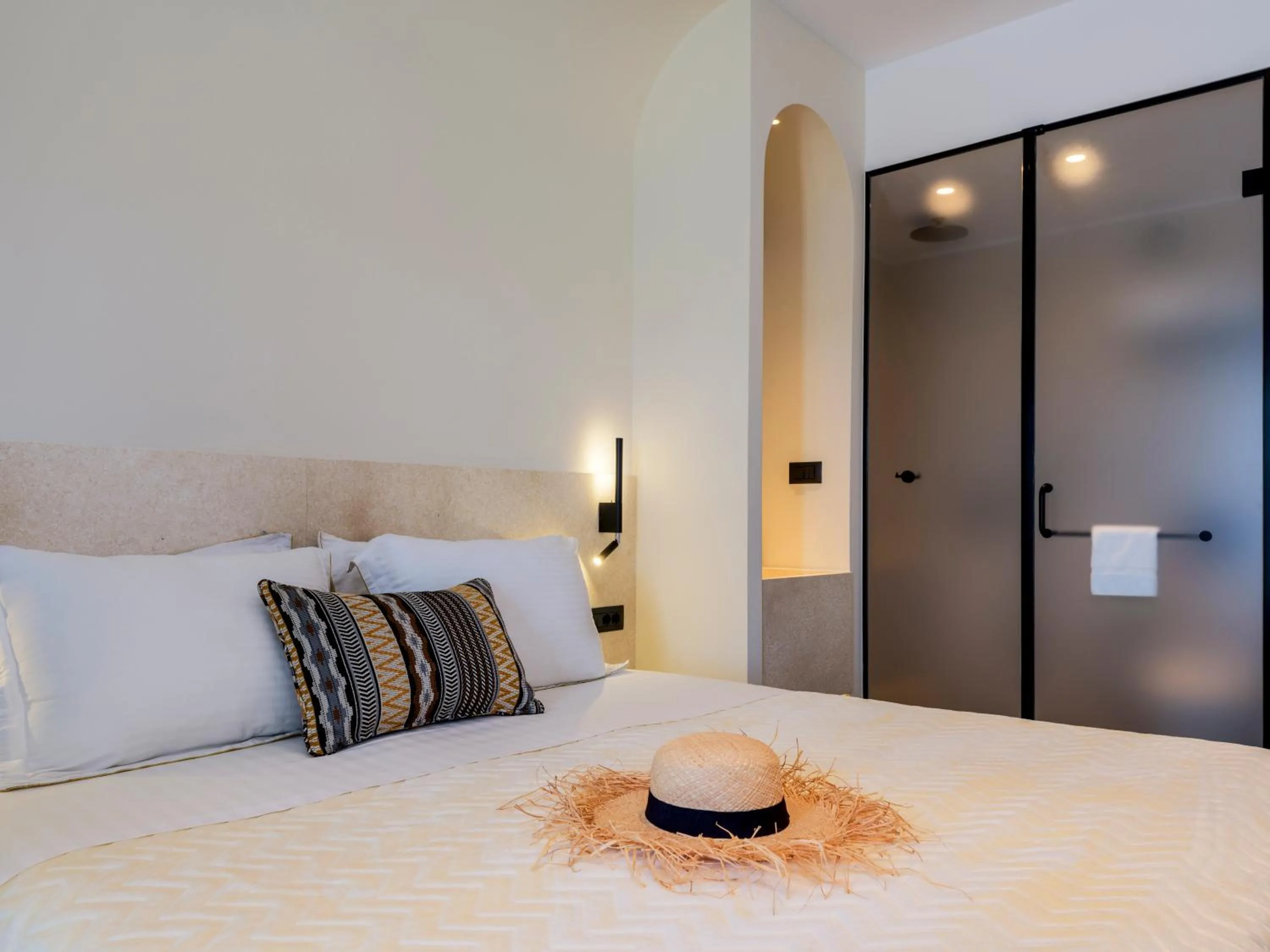 Bed in Yalos Hotel Sunset view Mykonos town private rooms