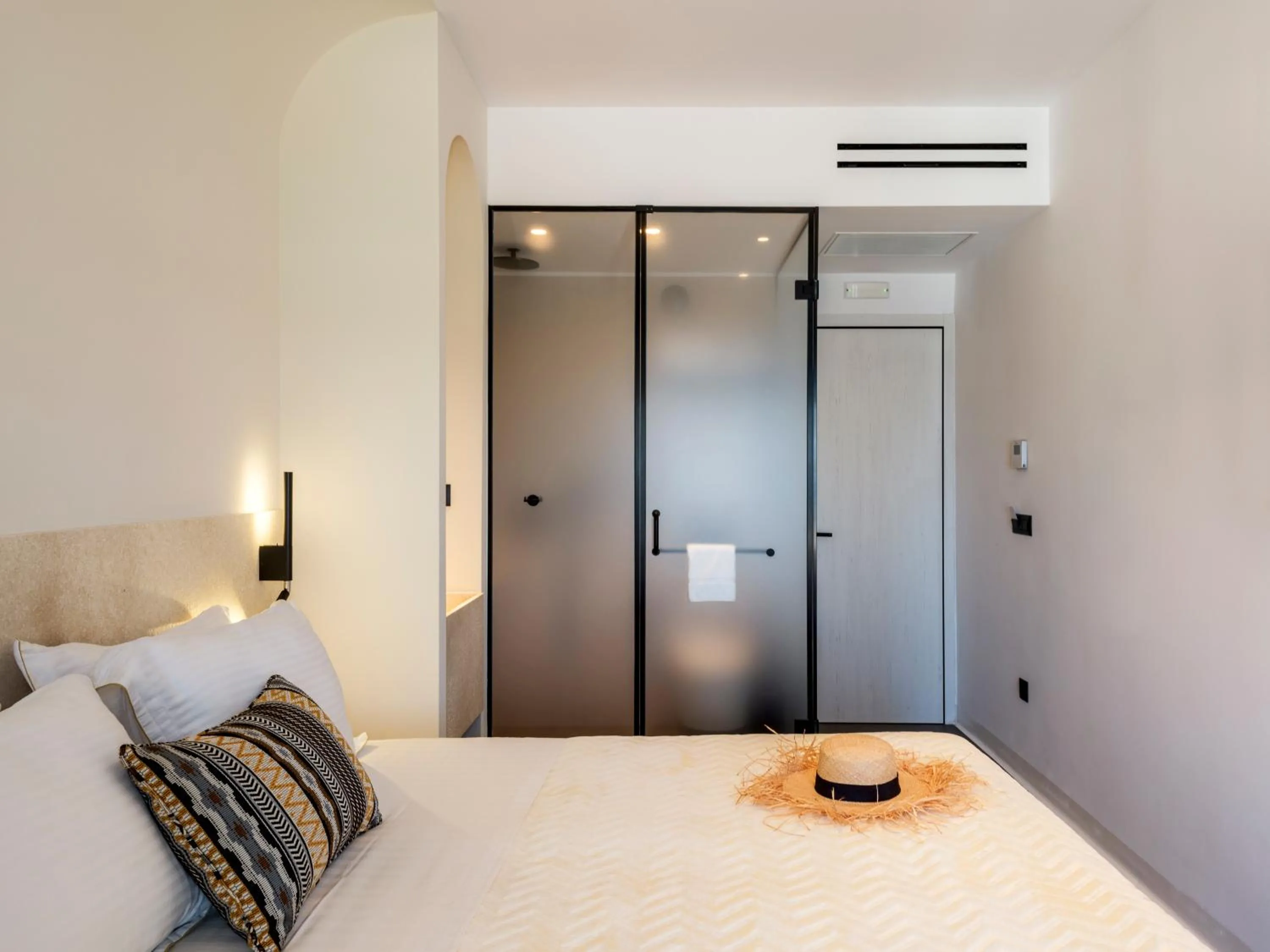 Bed in Yalos Hotel Sunset view Mykonos town private rooms