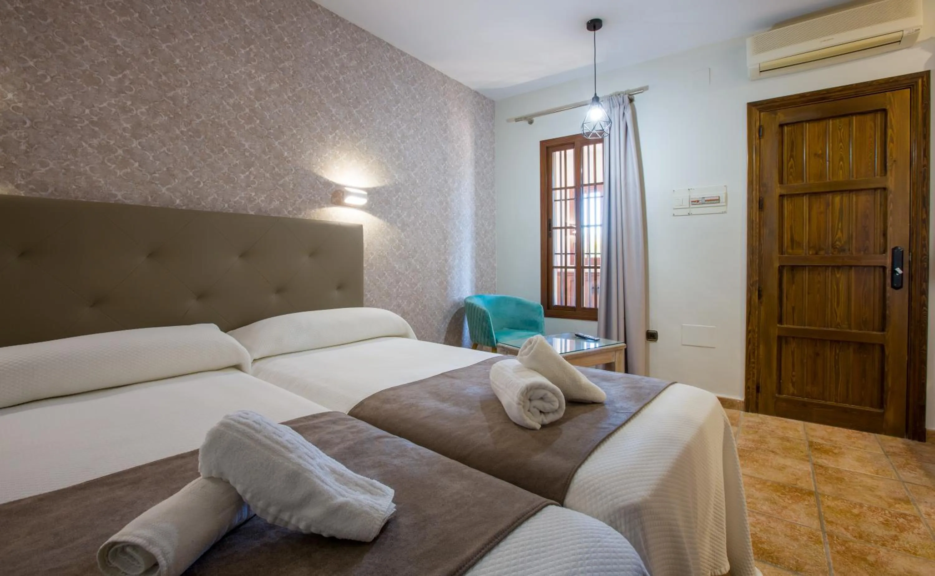 Decorative detail, Bed in Hostal Don Joaquín Alora