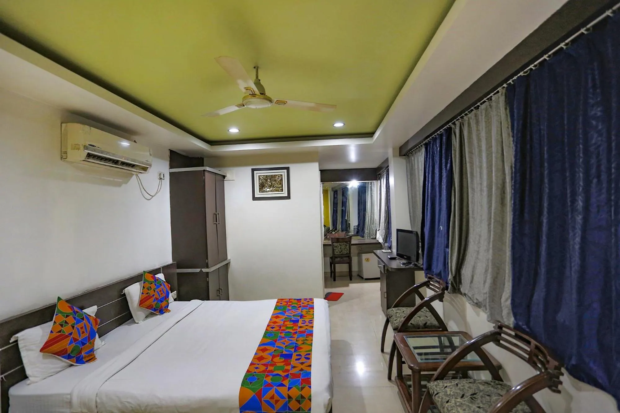 Bed in FabHotel Midland