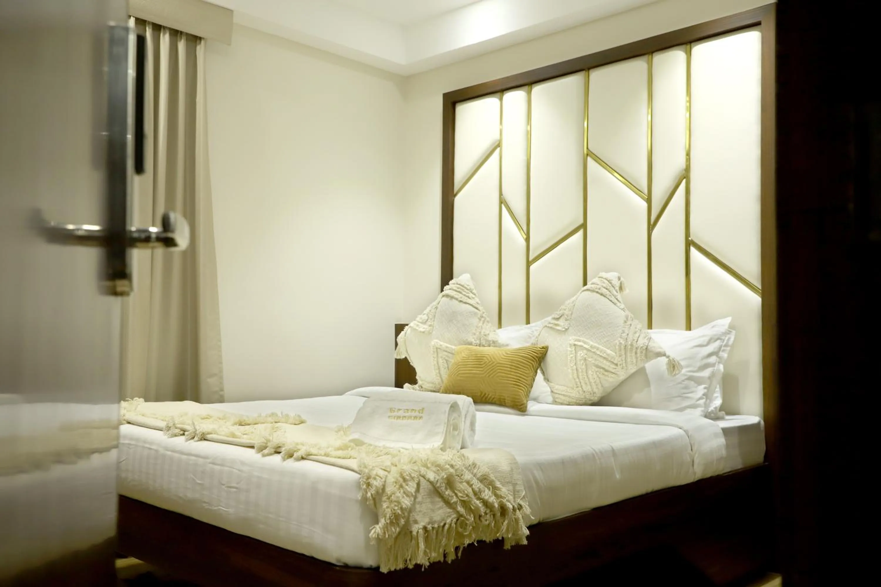 Bed in Hotel Grand Girdhar