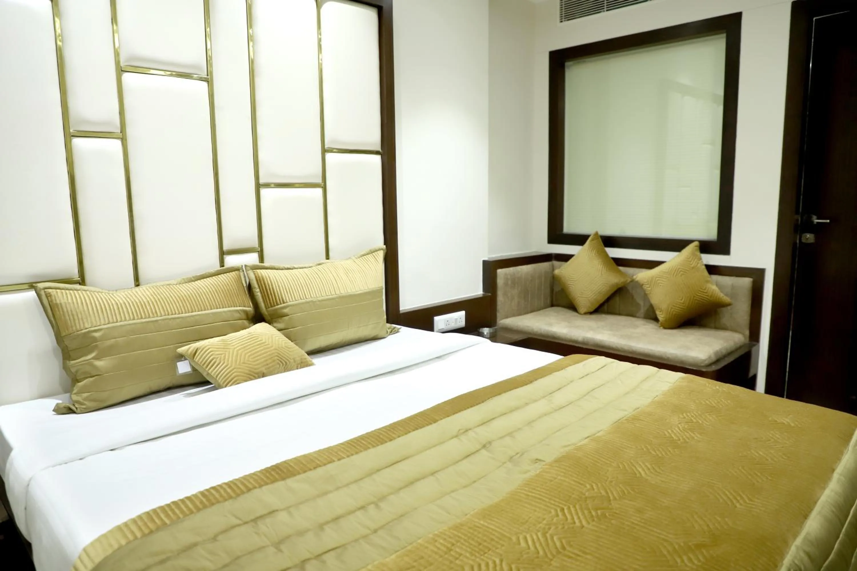 Bed in Hotel Grand Girdhar