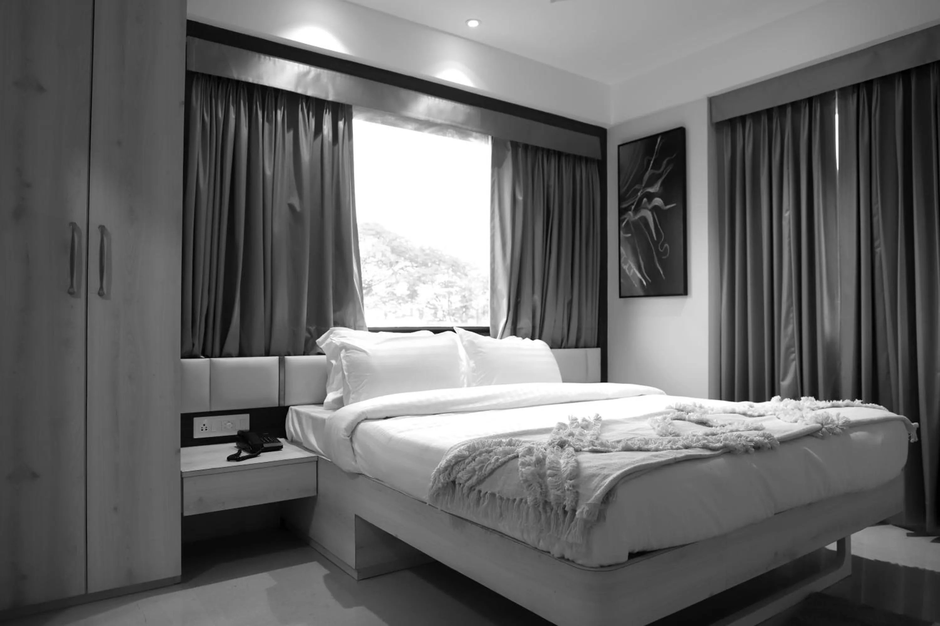 Bed in Hotel Grand Girdhar