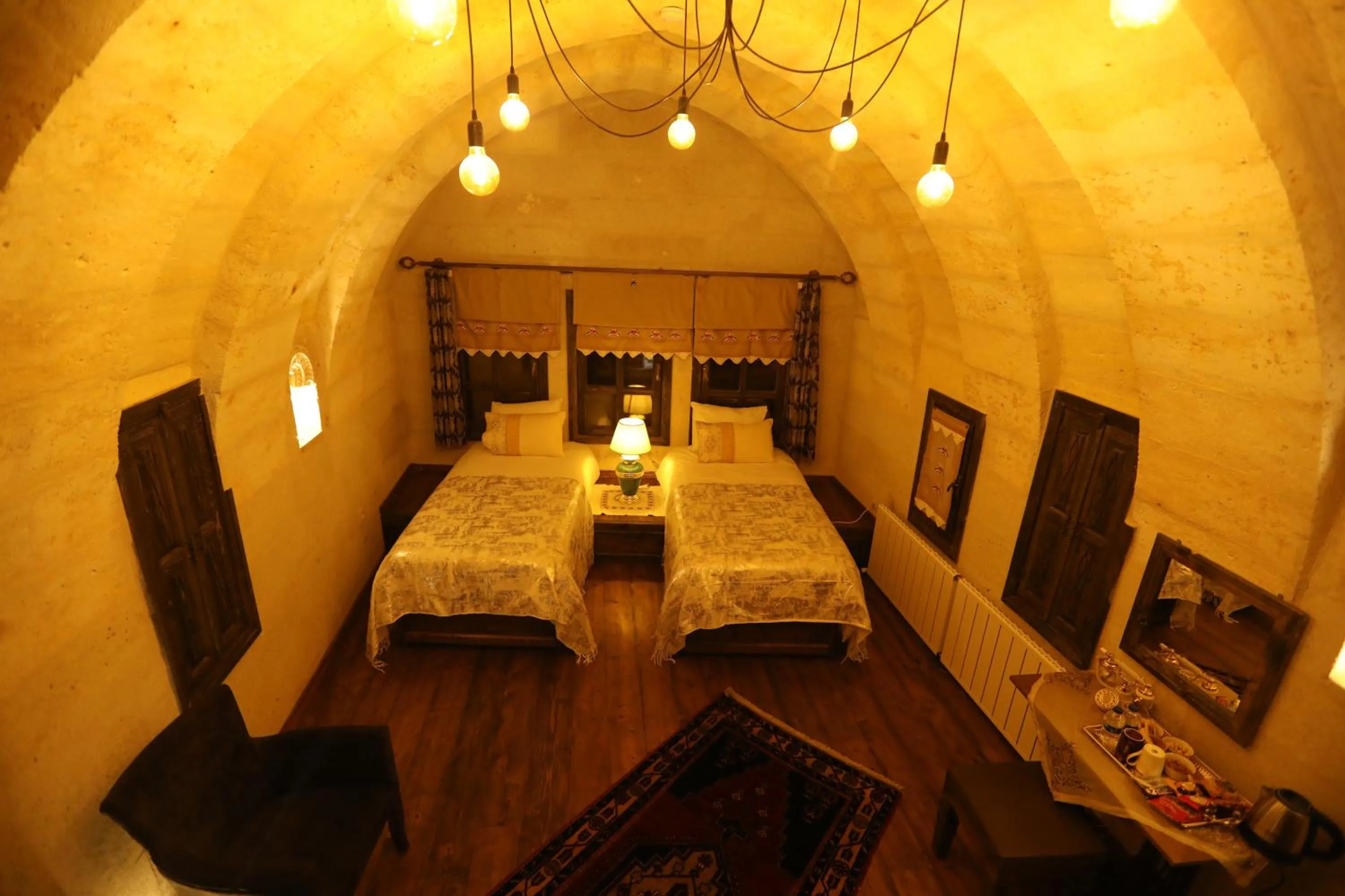 Bed in Hancı Cave Hotel