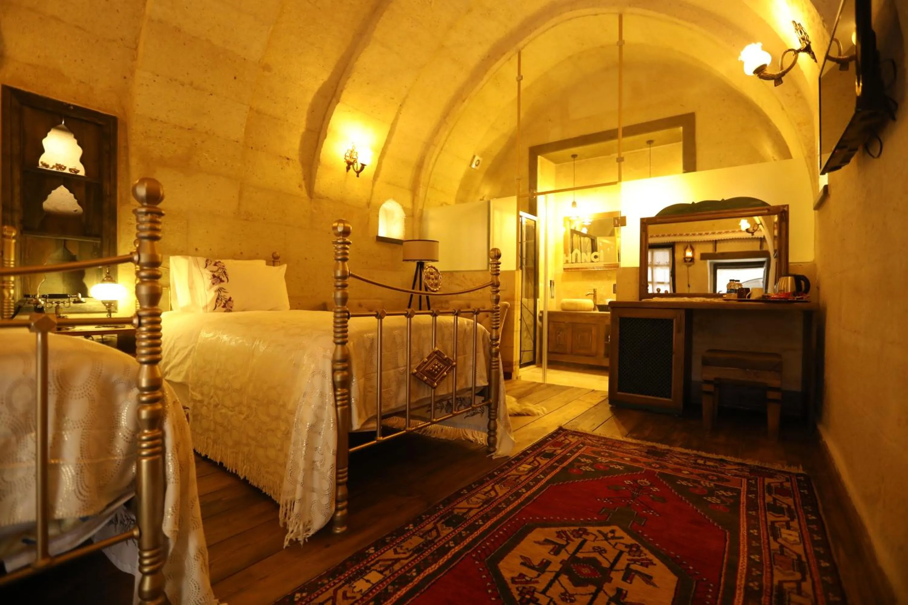 Bed in Hancı Cave Hotel