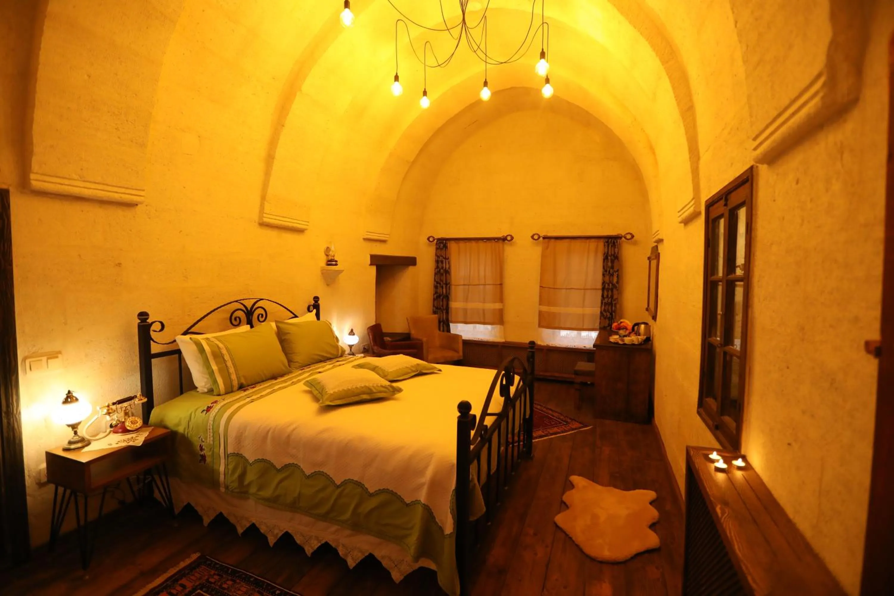 Bed in Hancı Cave Hotel