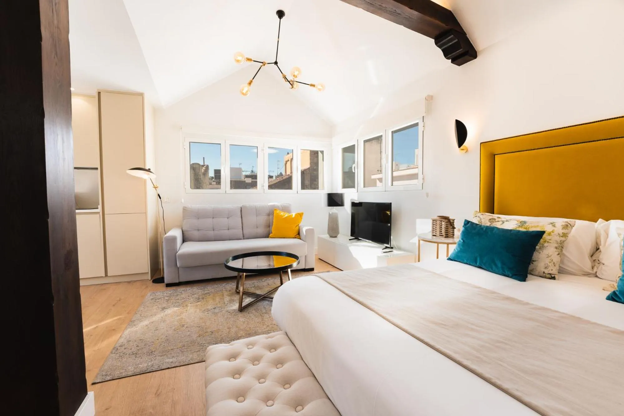 Bed in Debambú Suites