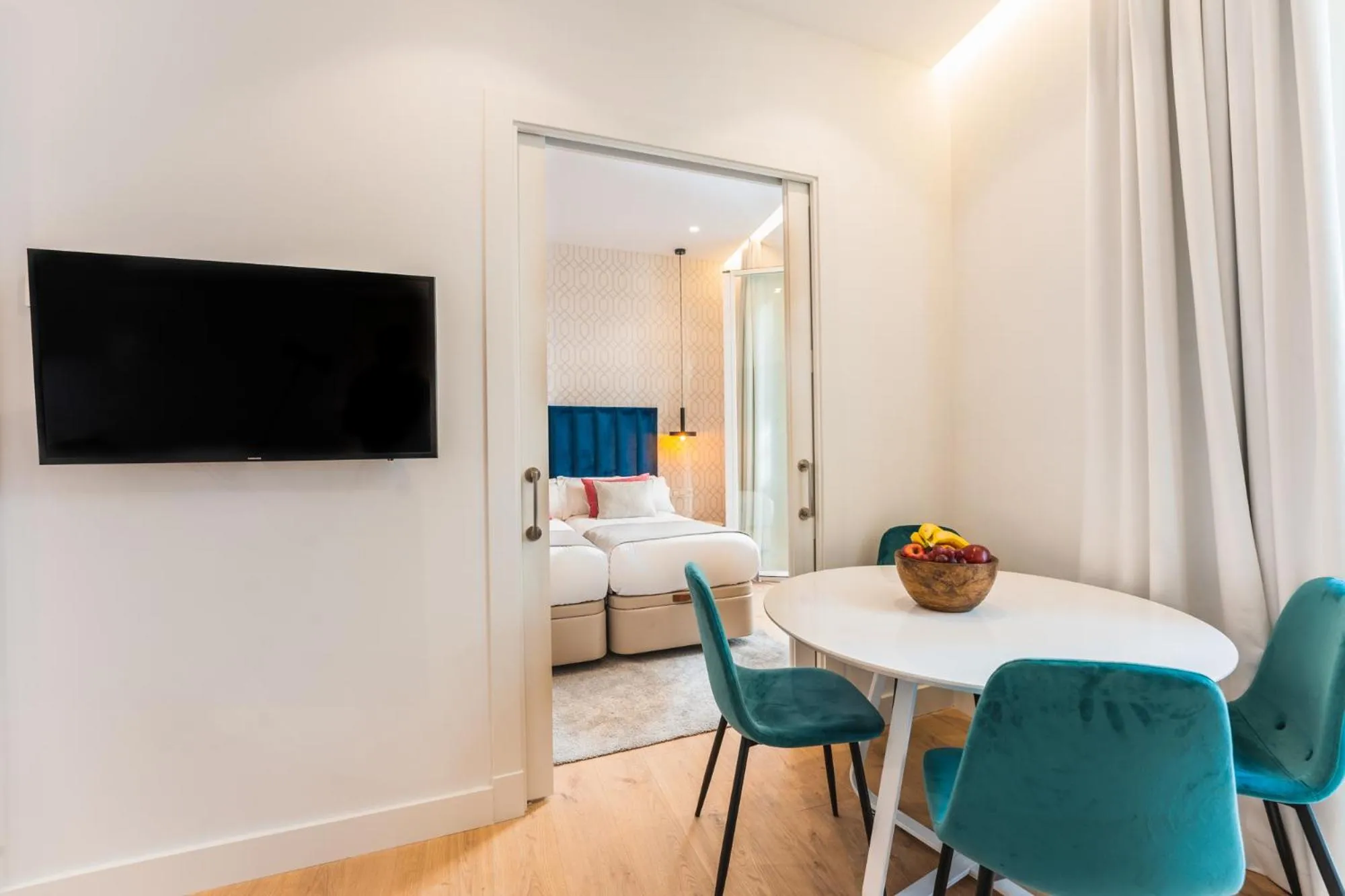 Bed in Debambú Suites