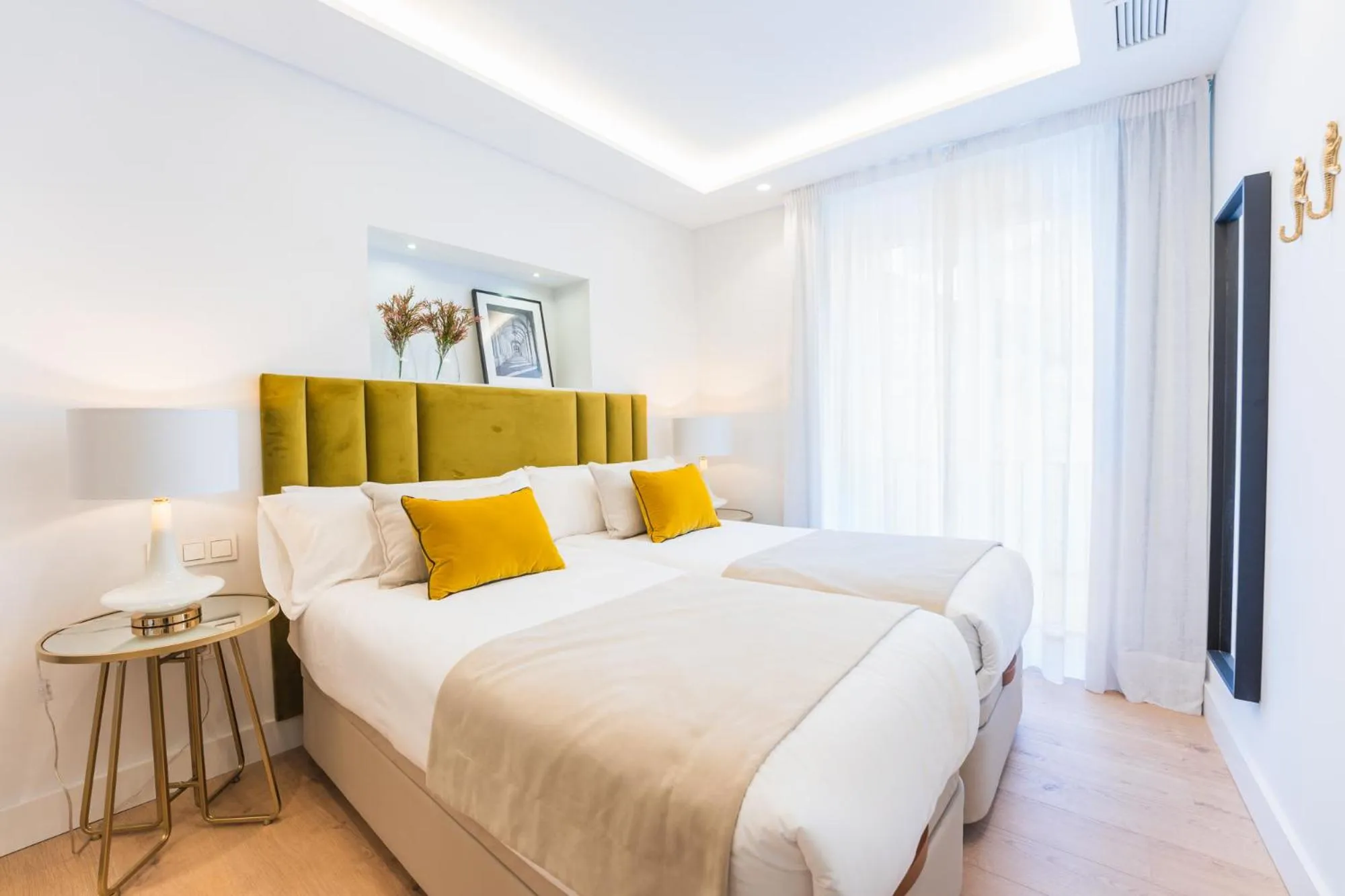 Bed in Debambú Suites