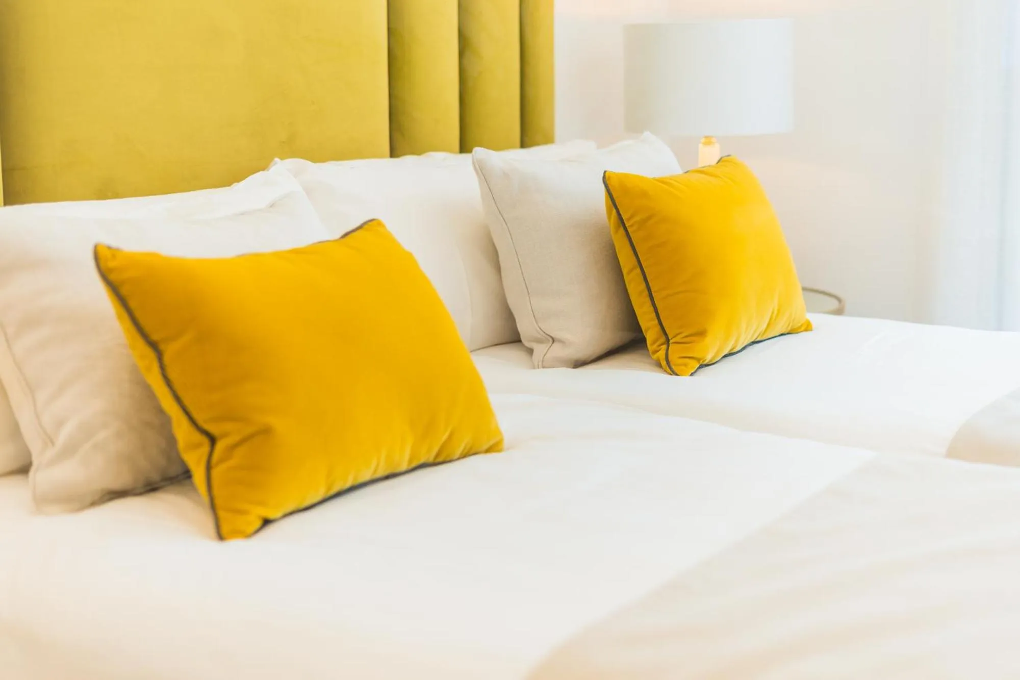 Bed in Debambú Suites