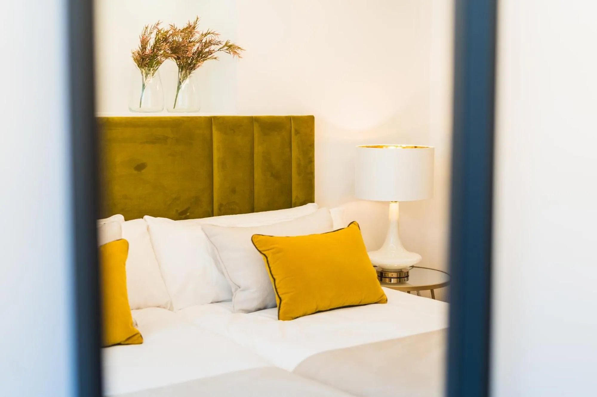 Bed in Debambú Suites