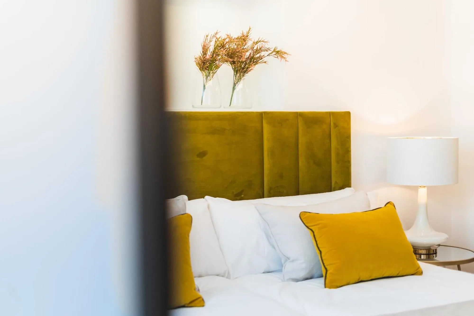 Bed in Debambú Suites