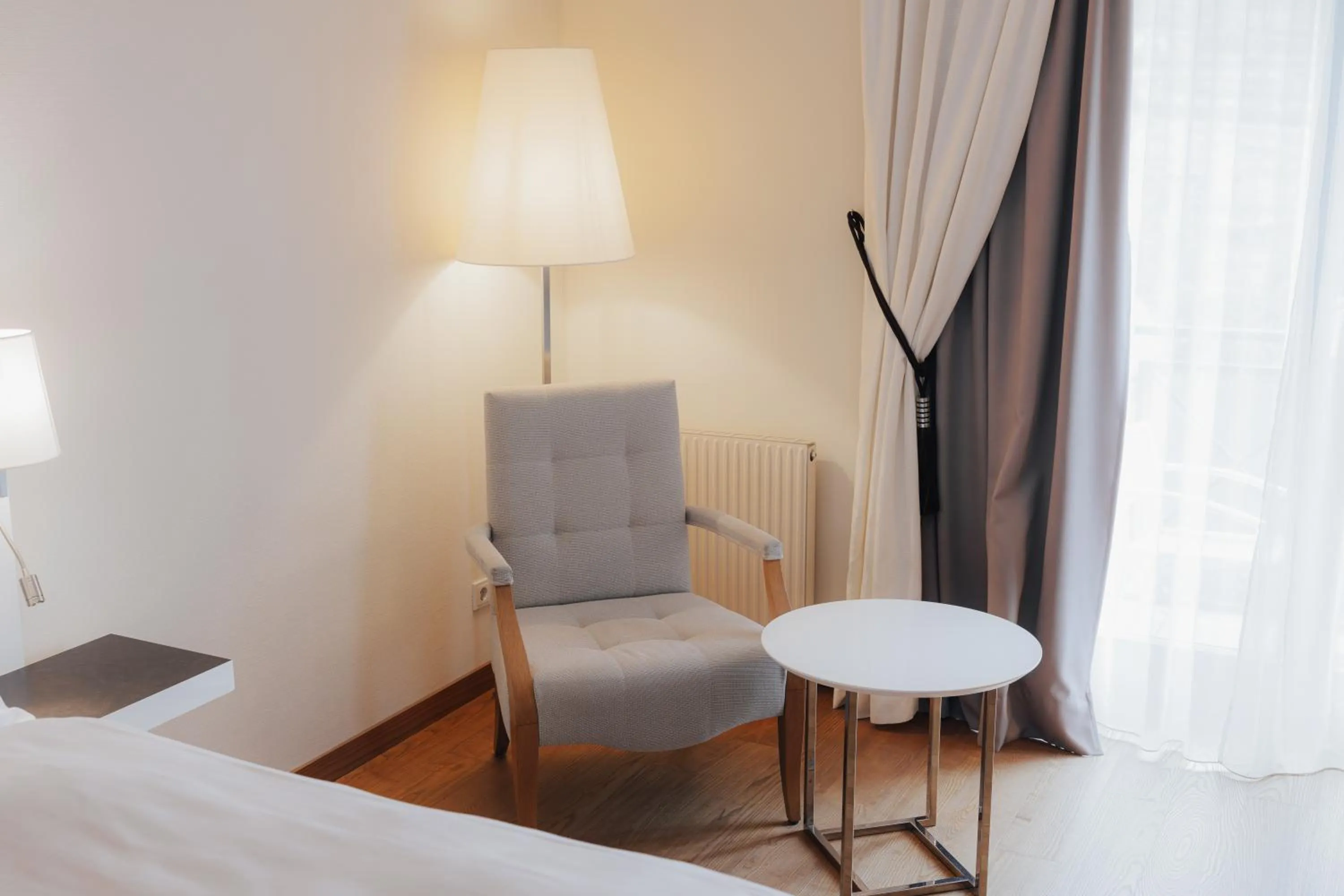 Seating area, Bed in Steigenberger Hotel & Spa Krems