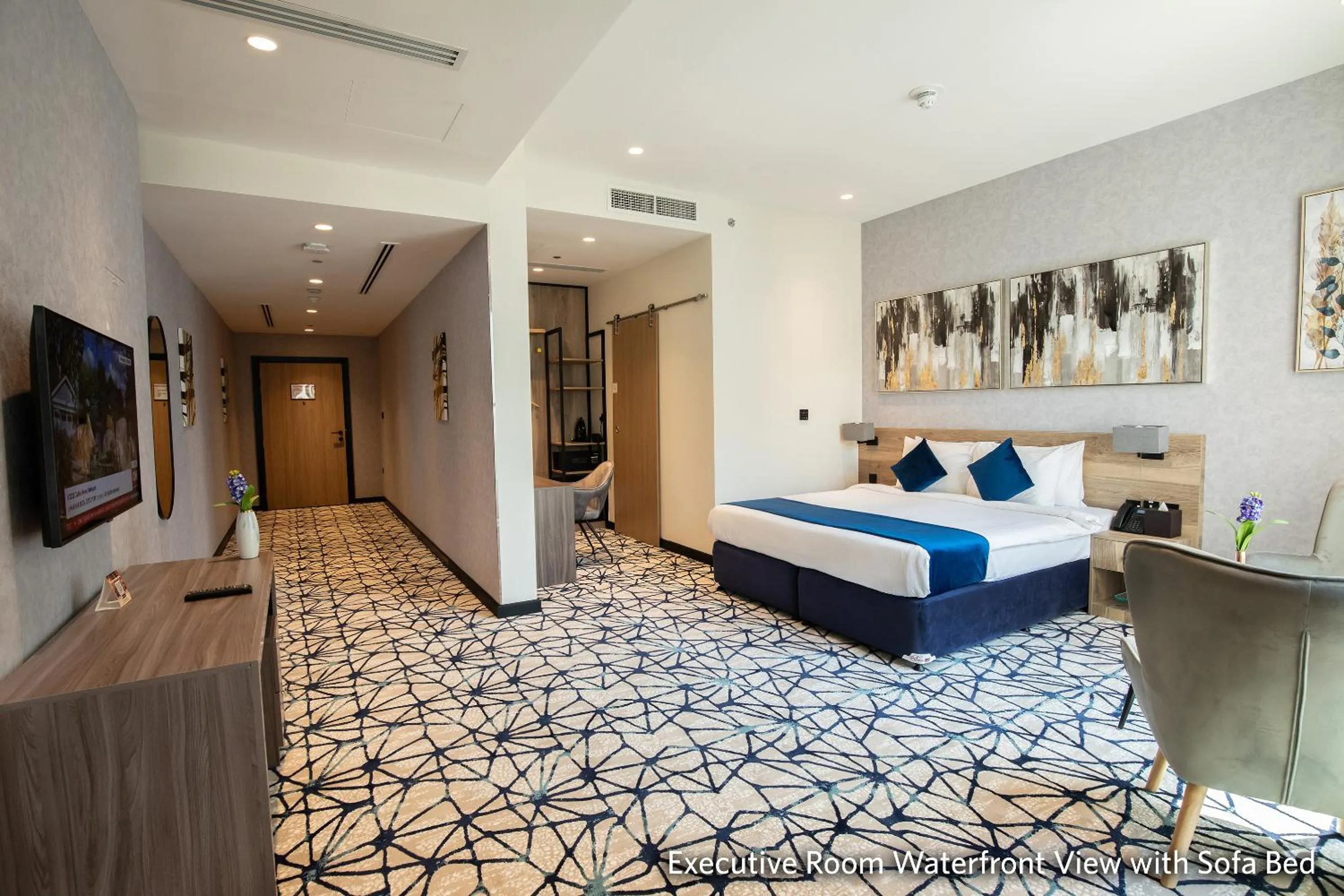 Bed in Grand Kingsgate Jaddaf Waterfront Hotel by Millennium