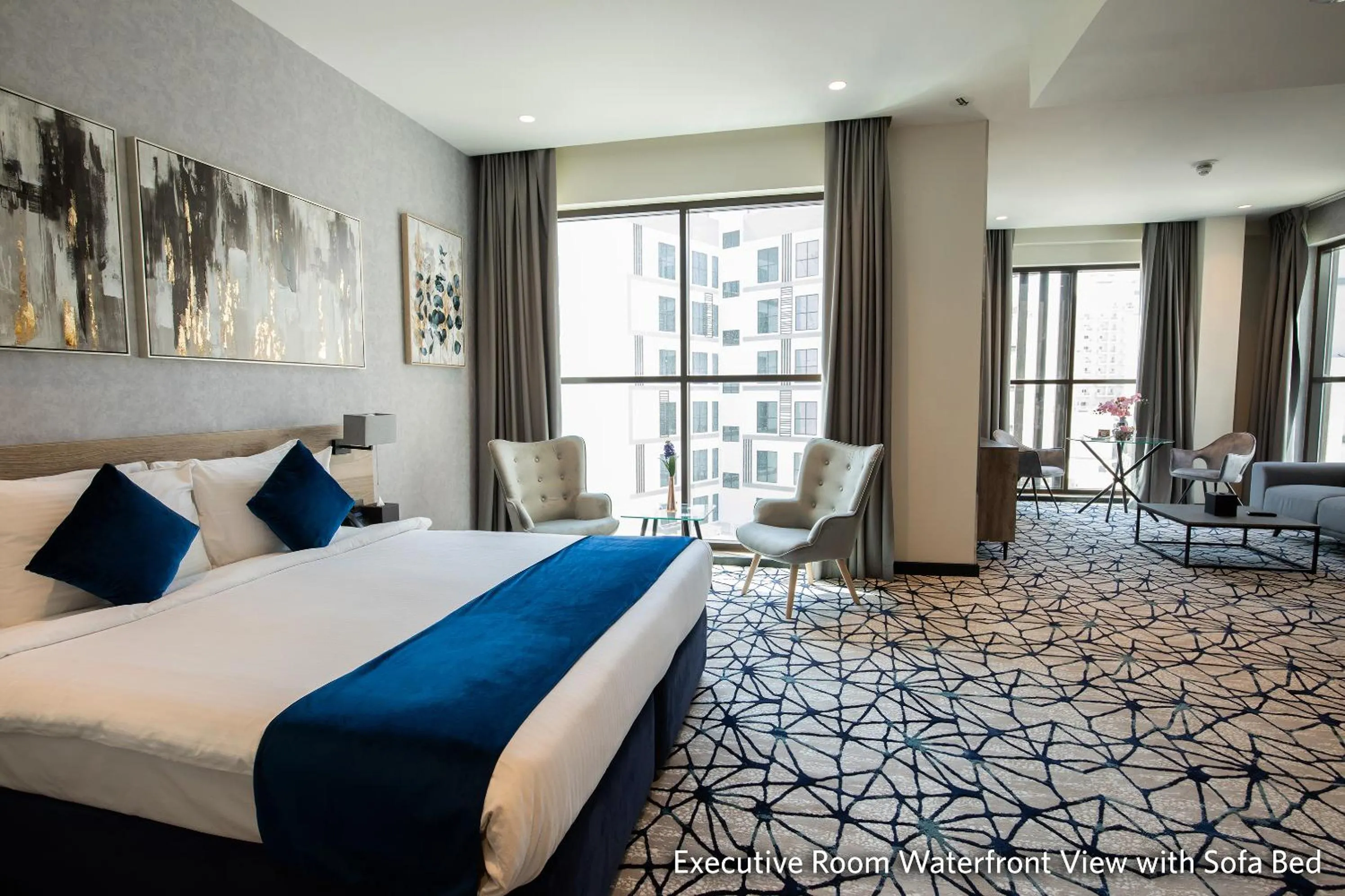 Bed in Grand Kingsgate Jaddaf Waterfront Hotel by Millennium