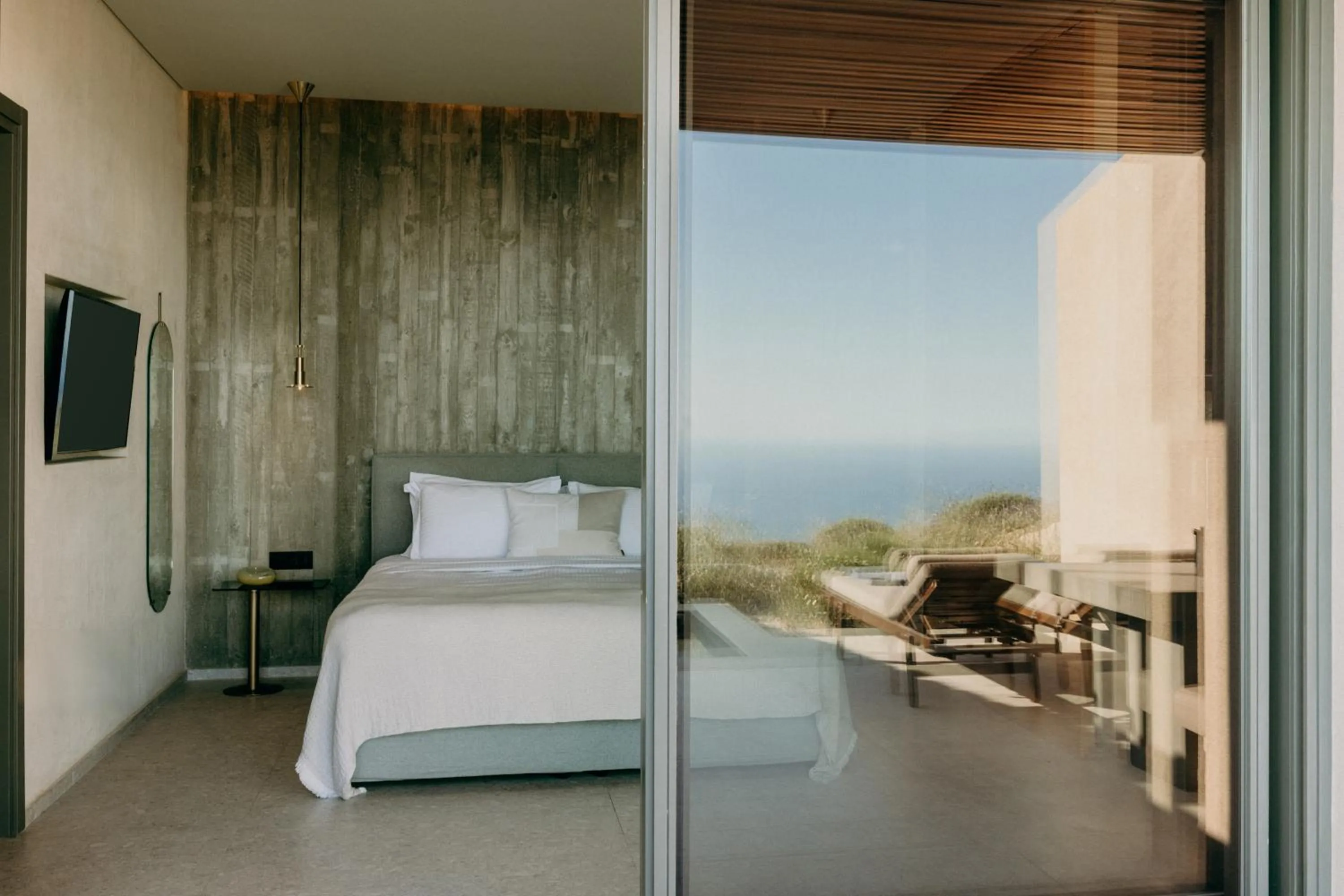 Bed in Santorini Sky, Luxury Resort