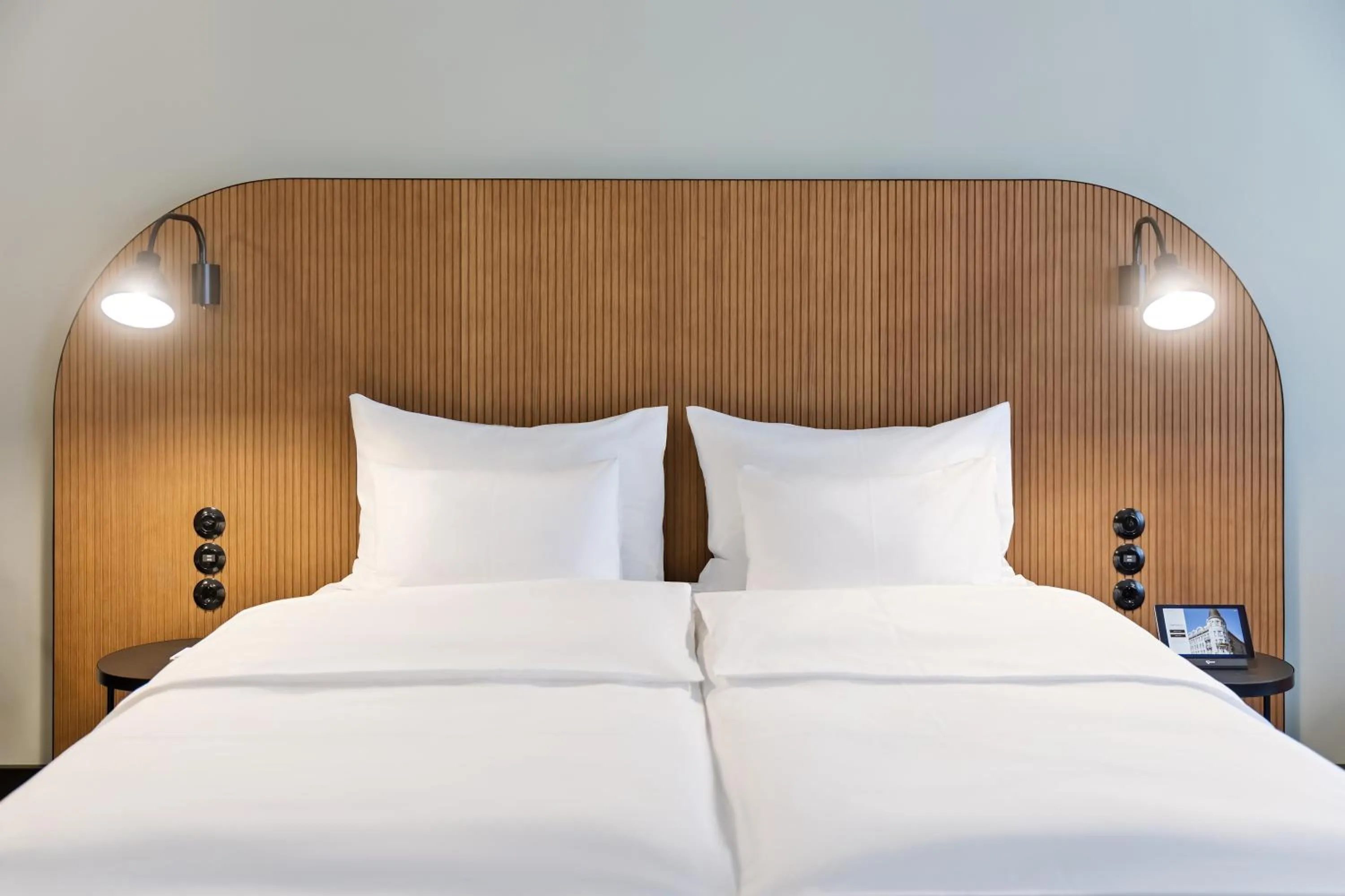 Bed in Hotel Astoria Vienna, Curio Collection by Hilton