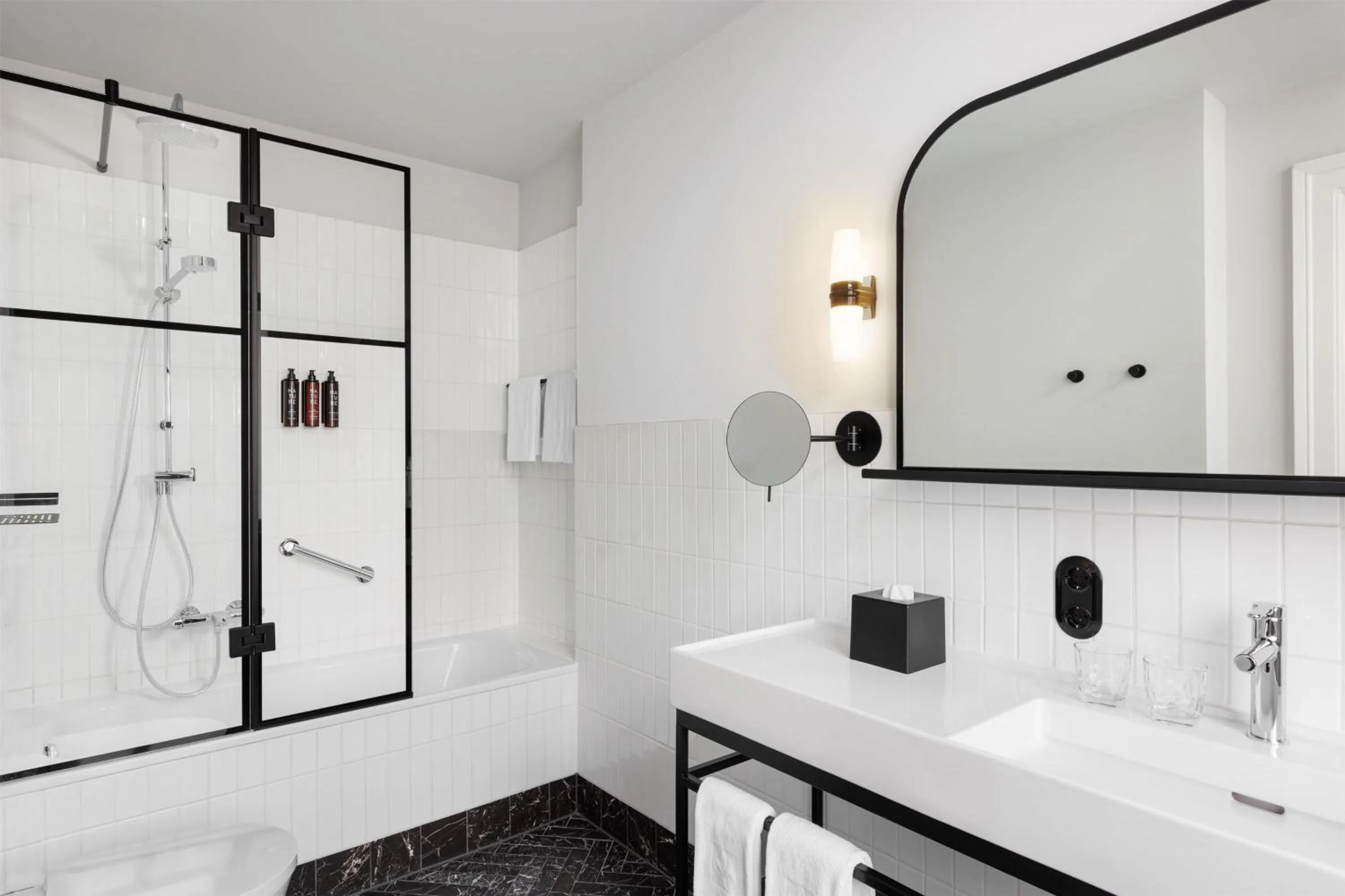 Bathroom in Hotel Astoria Vienna, Curio Collection by Hilton