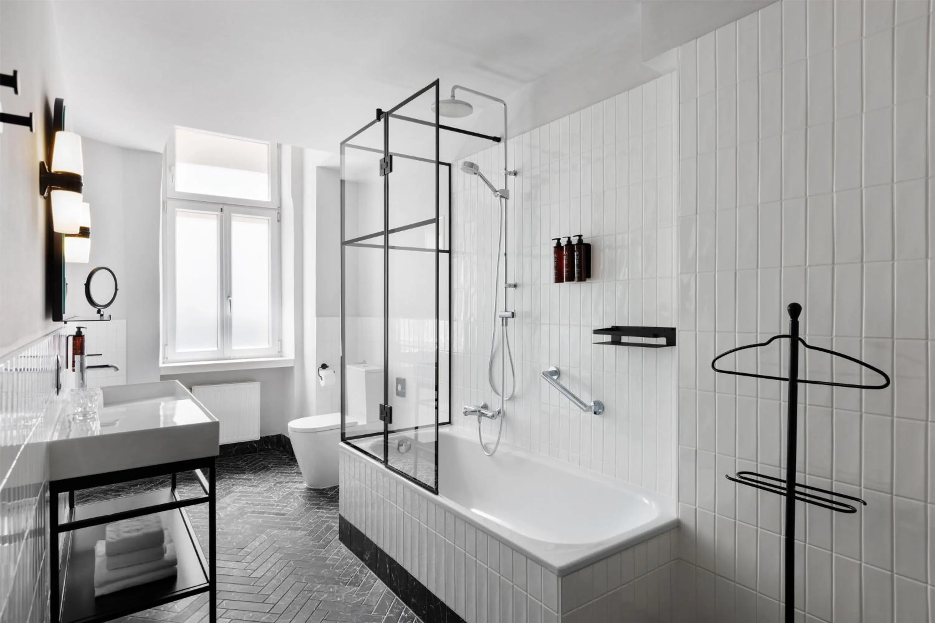Bathroom in Hotel Astoria Vienna, Curio Collection by Hilton