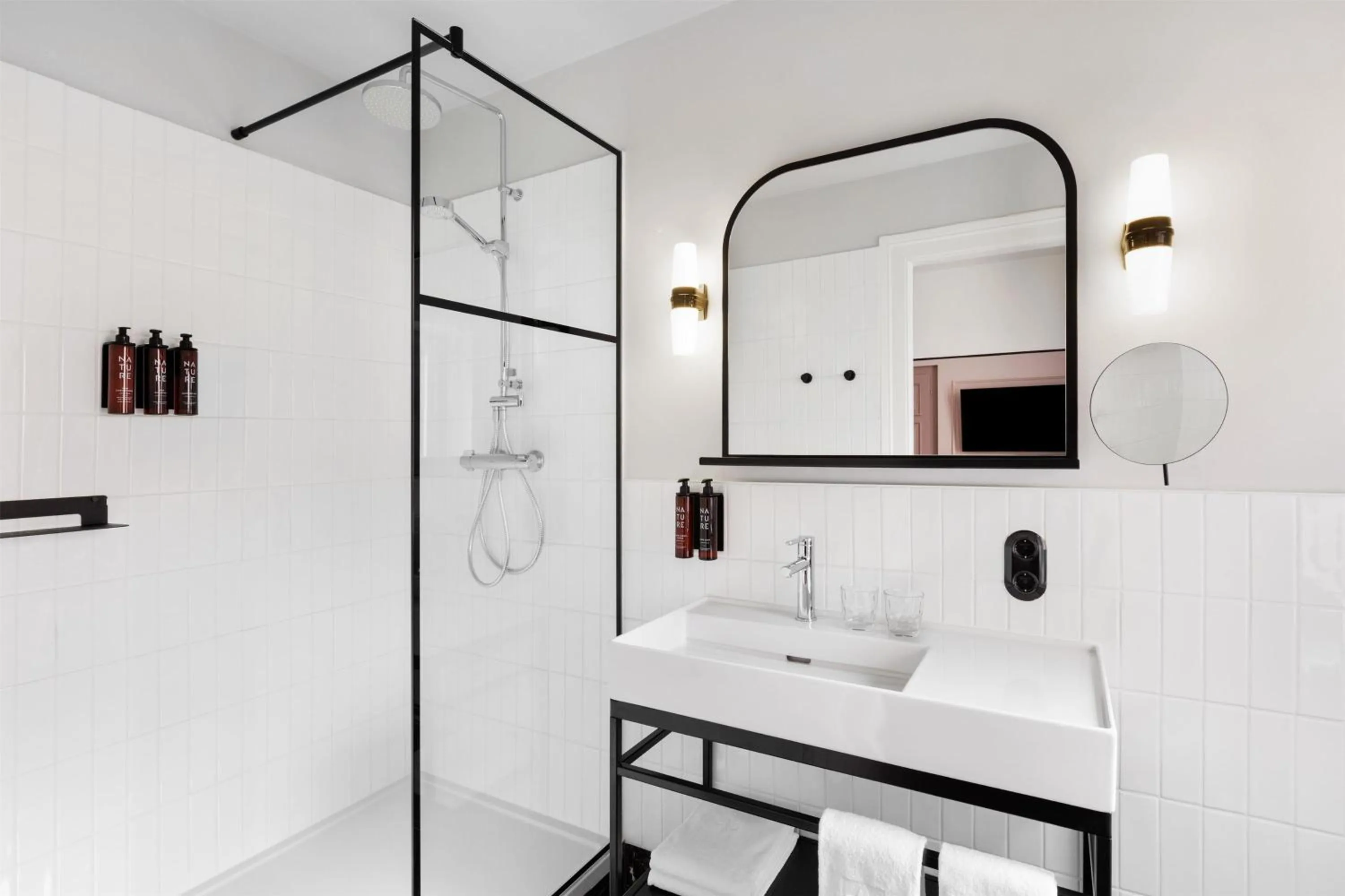 Bathroom in Hotel Astoria Vienna, Curio Collection by Hilton