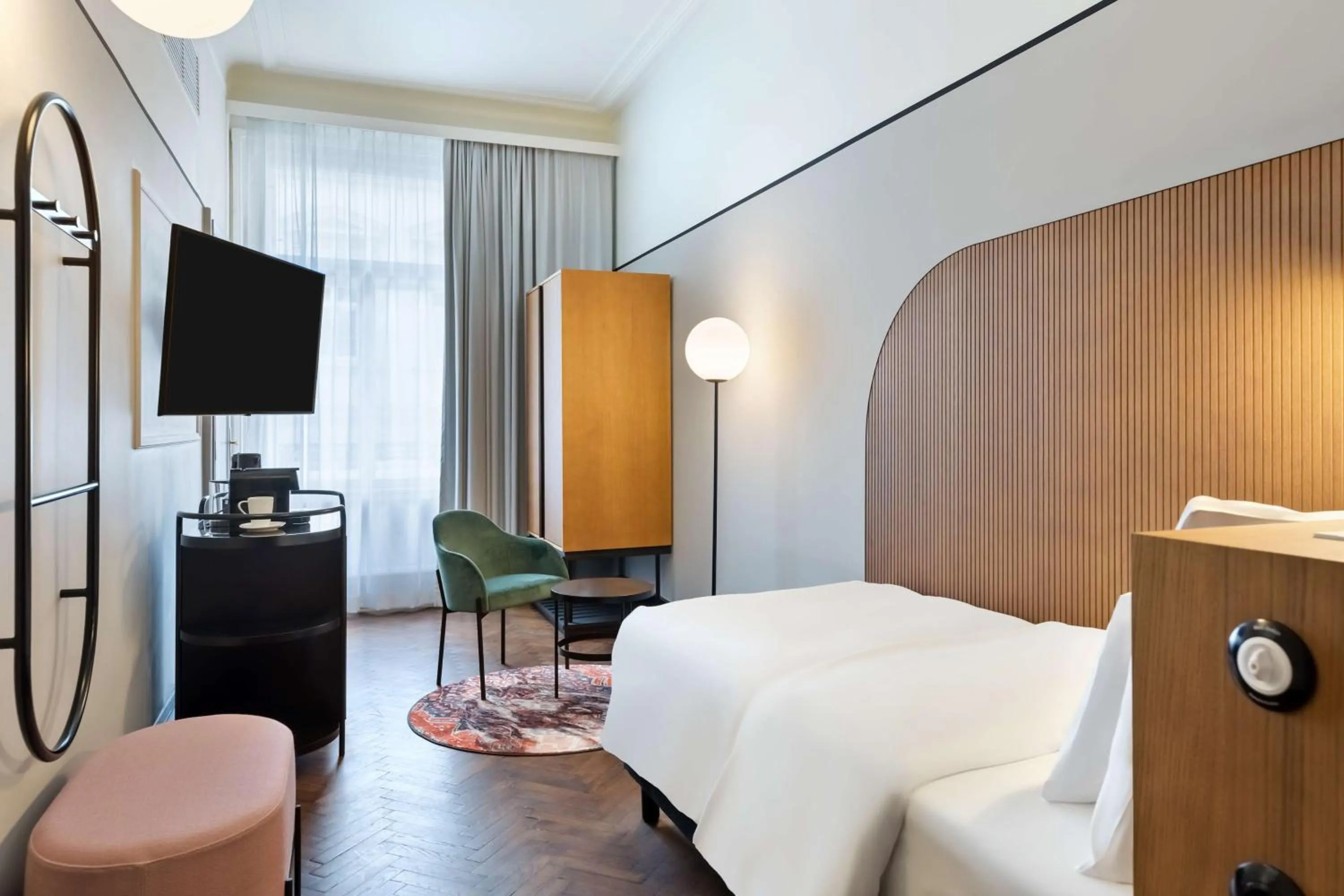 Bed in Hotel Astoria Vienna, Curio Collection by Hilton