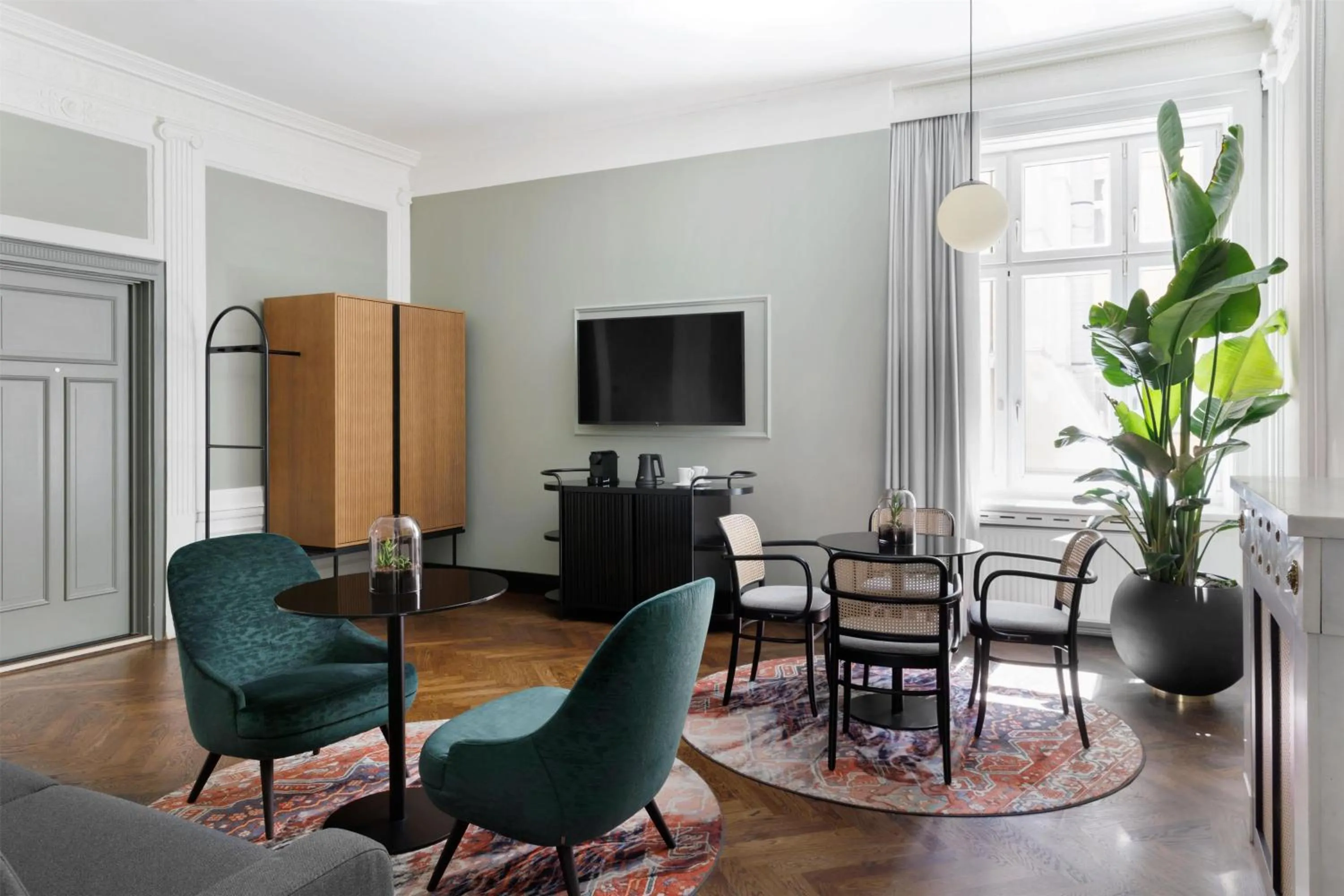 Living room in Hotel Astoria Vienna, Curio Collection by Hilton