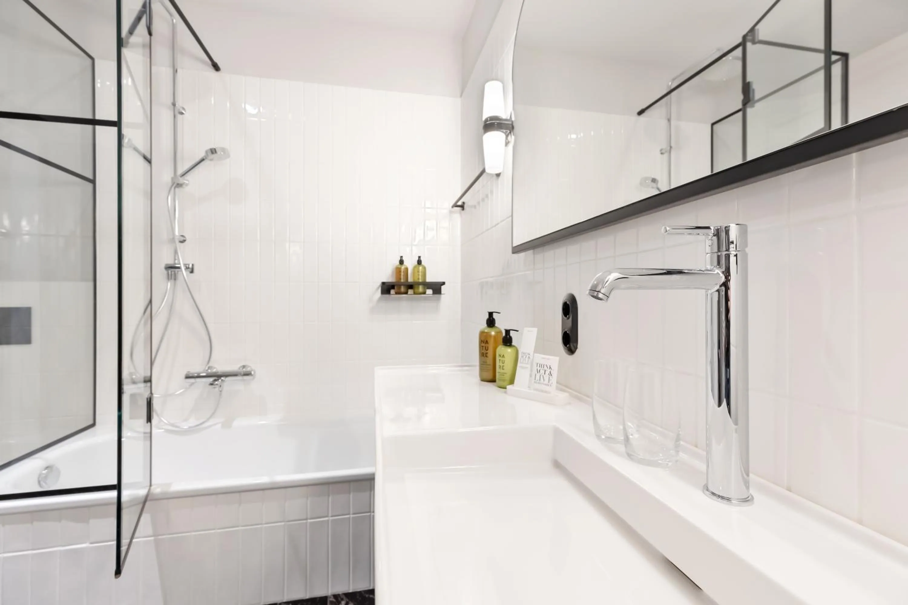 Bathroom in Hotel Astoria Vienna, Curio Collection by Hilton