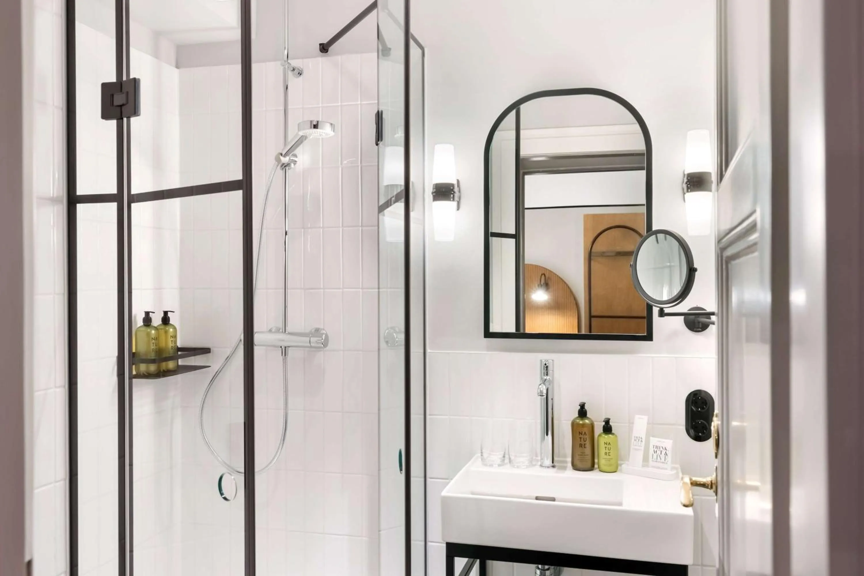Bathroom in Hotel Astoria Vienna, Curio Collection by Hilton